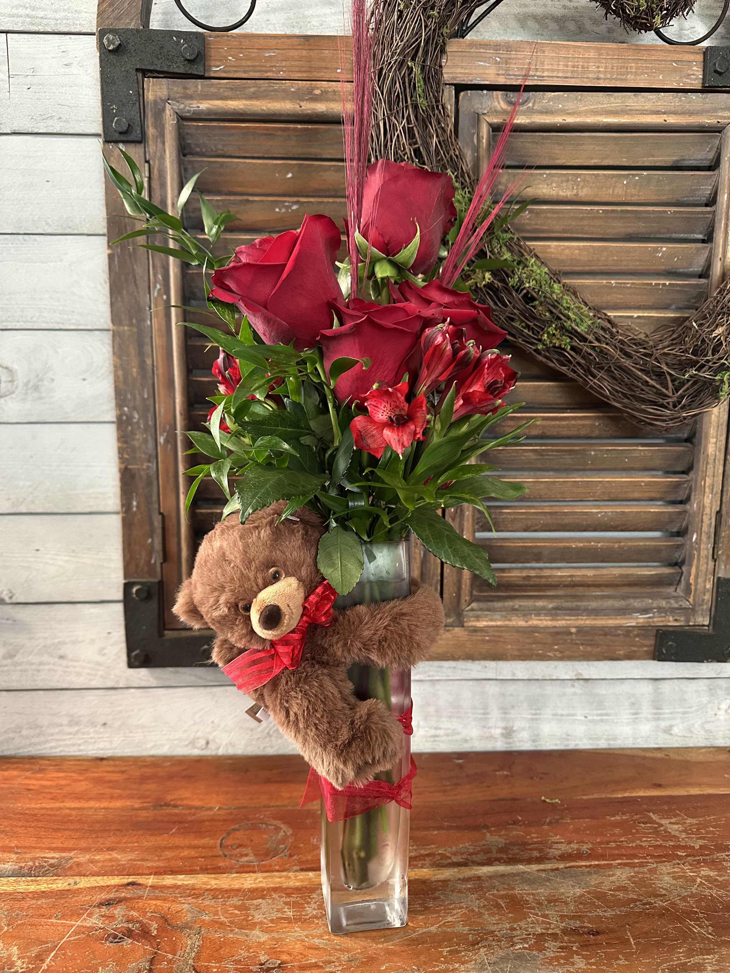 A Little Valentine A Little Valentine - A charming Valentines arrangement of roses with a teddy bear included. For pick-up only.