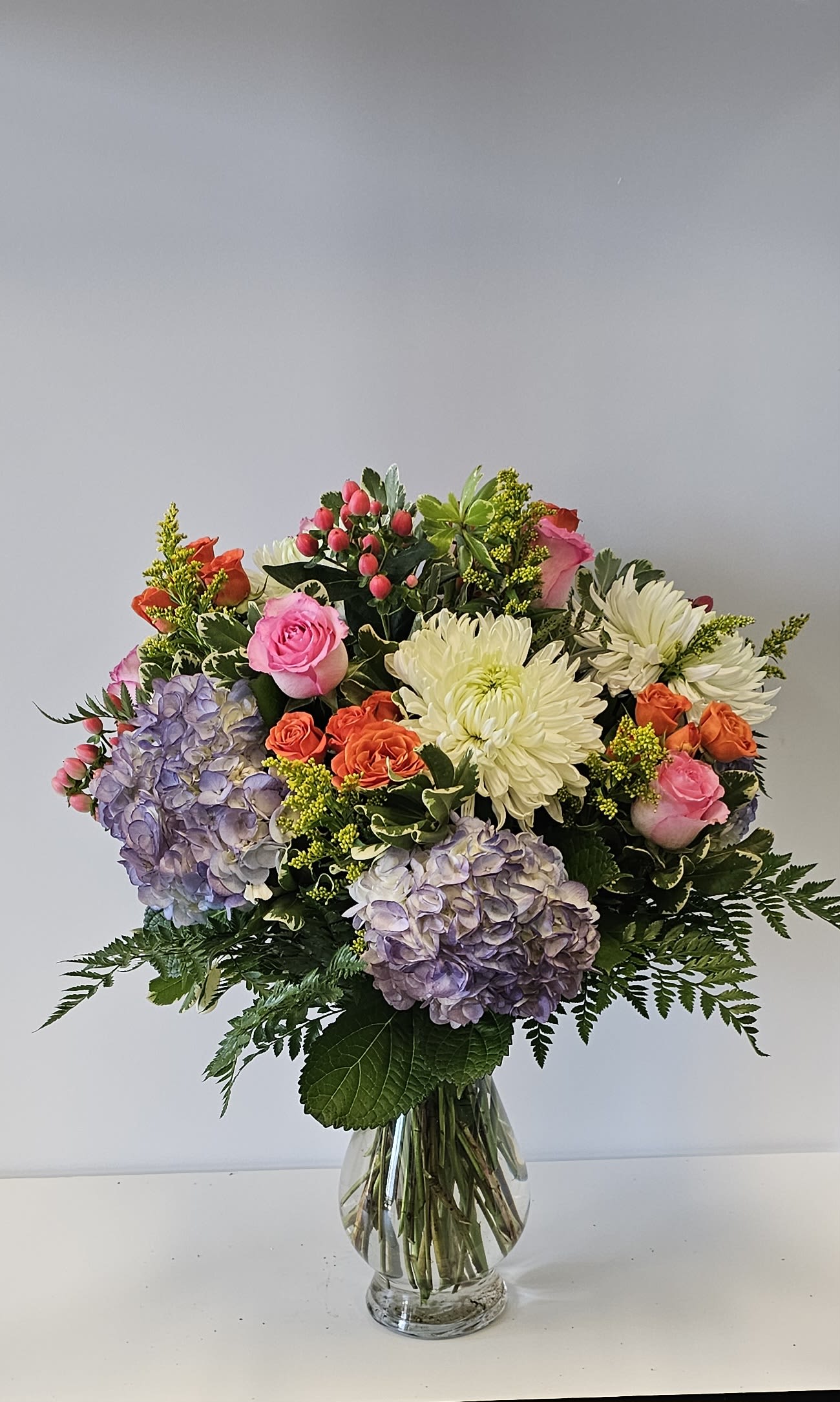 Lavender Kiss - A fun colorful arrangement that will bring joy to all. 