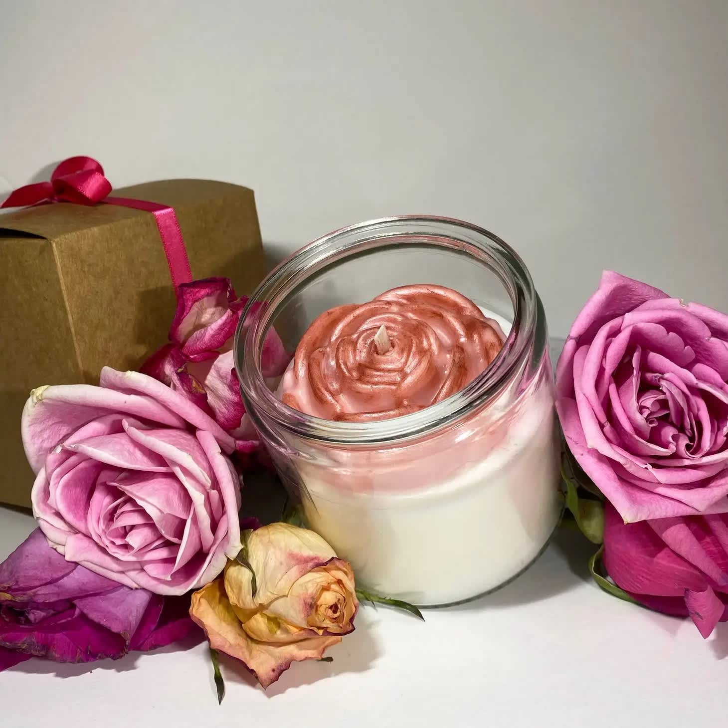 Bohemian Queen Candle - Eco-Friendly, 12oz - Multifaceted™ Artisan Candles Our special artisan-inspired shades of pink 'Queen' edition is created to celebrate the strength, courage, and charisma of women. This candle includes a gift box and one-of-a-kind rose top with shades of pink accents. This combination of pink roses represent grace, humility &amp; harmony. Scent: Queen is a feminine blend of shea butter &amp; coconut oil with a hint of vanilla. 