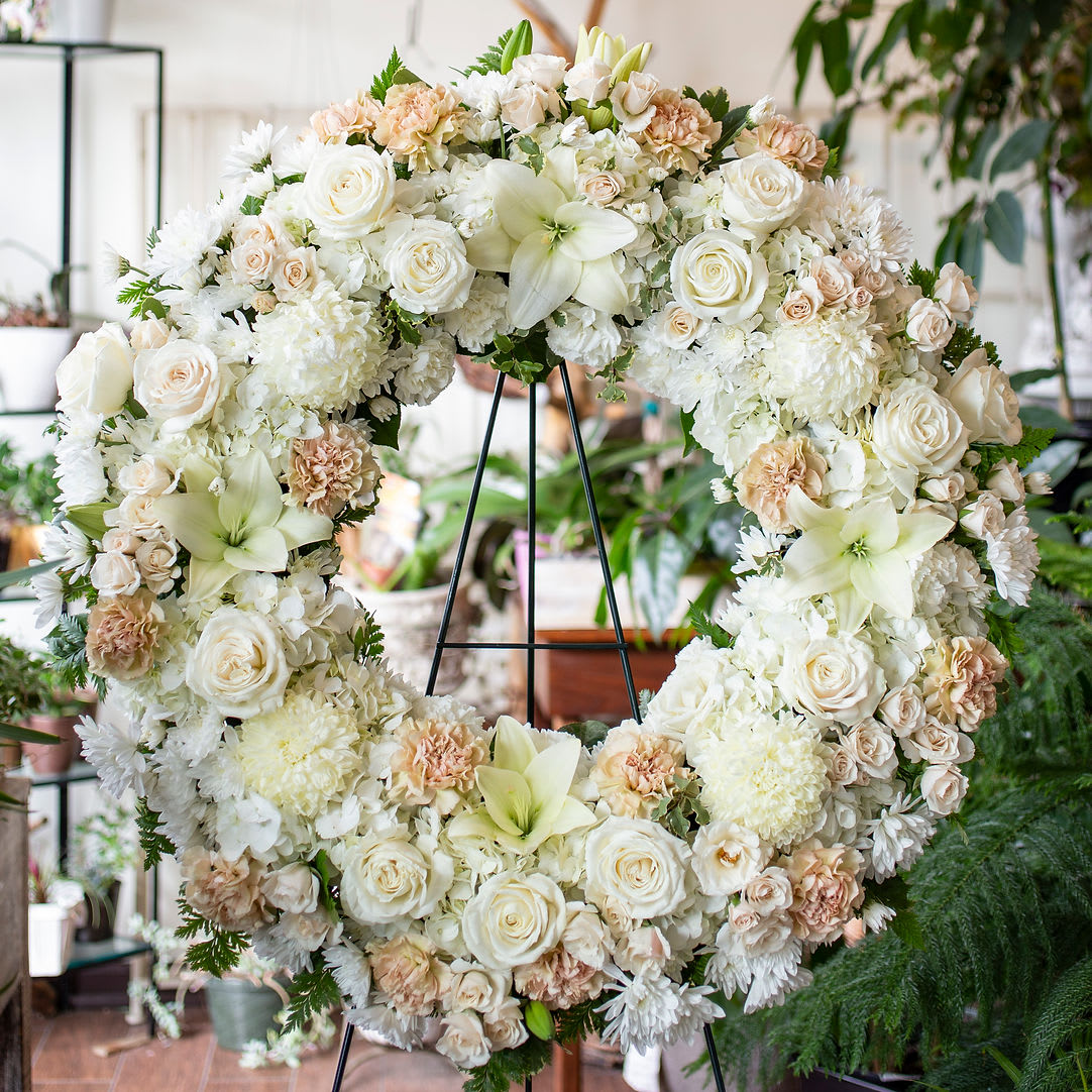 Betty White - Classy, elegant and timeless wreath with pale and white blooms.