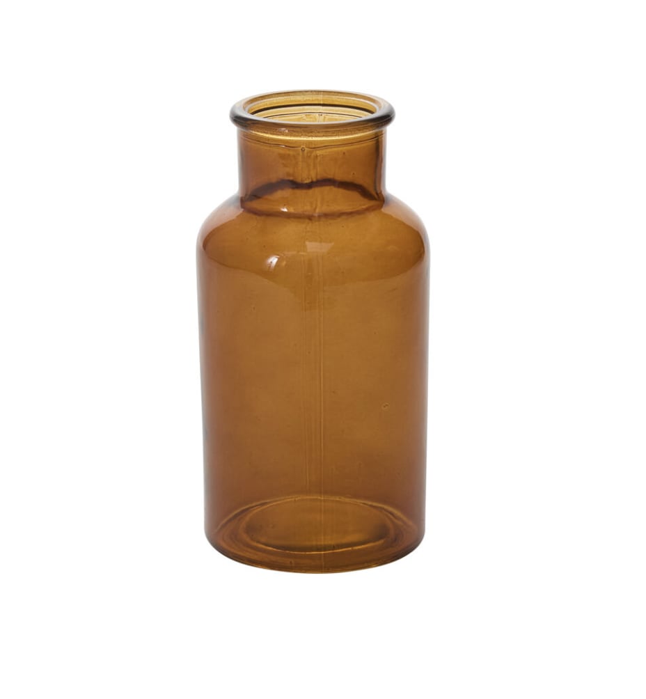 Amber Billie Bottle Medium - Let the flowers steal the show with the Amber Billie Bottle Medium, a warm, translucent amber vase that beautifully bridges size and presence in this charming collection. Perfect for showcasing fuller stems or grouping with other sizes for a collected, inviting display.  Opening Size: 1.75&quot; Material: Glass Dimensions: 3.25 x 3.25 x 6.25