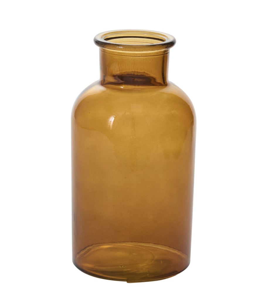 Amber Billie Bottle Large - Let the flowers steal the show with the Amber Billie Bottle Large, a warm, translucent amber vase designed to make a bold statement within this charming collection. Its generous opening and size are perfect for abundant arrangements or creating a striking grouped display.  Opening Size: 3&quot; Material: Glass Dimensions: 4.0 x 4.0 x 8.0