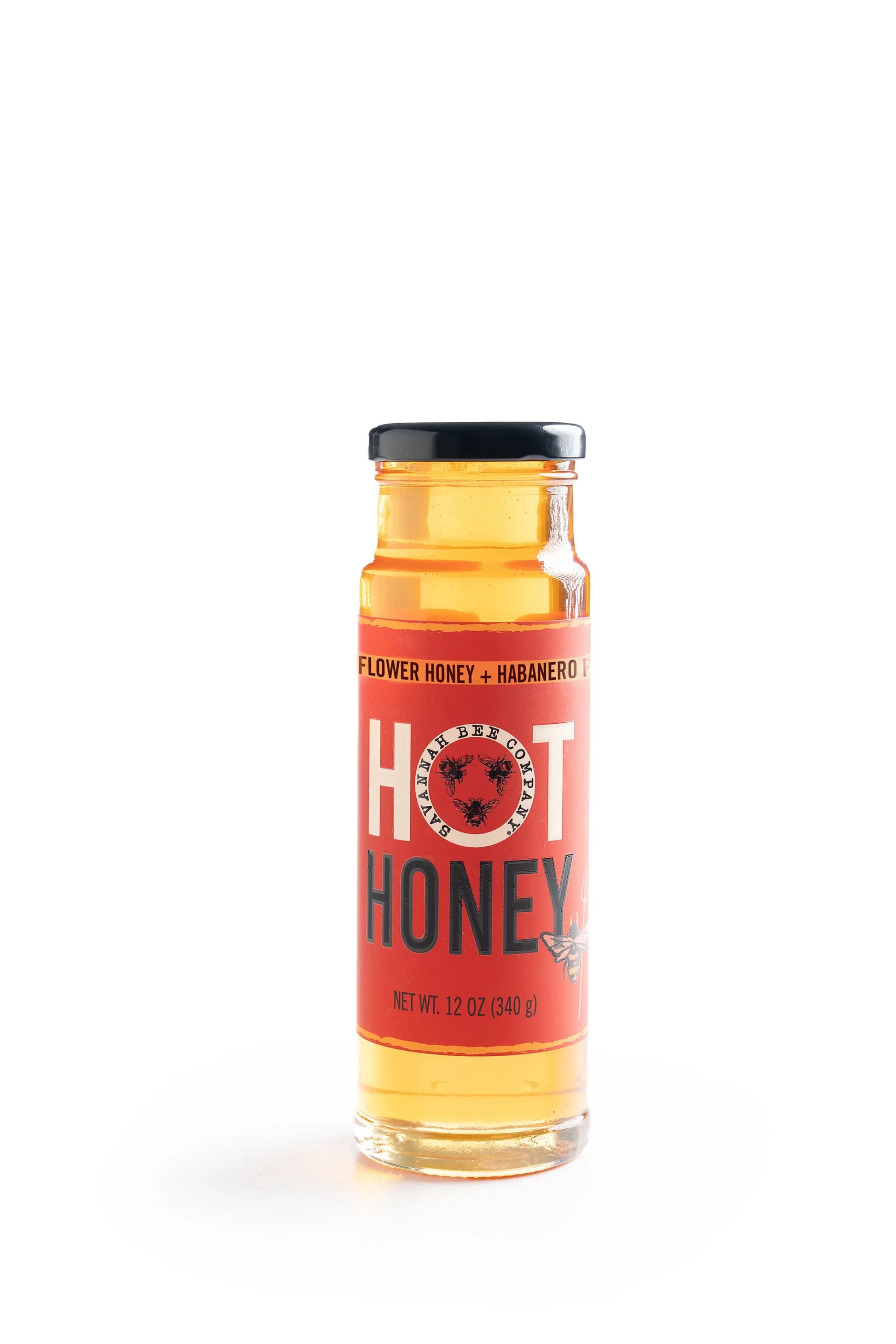 Hot Honey 12 oz  - Life tastes sweeter with a little bit of sting! We’ve infused our sweet Wildflower Honey with searing scotch bonnet and habanero peppers for a complex condiment that uplevels your favorite savory dishes, baked goods, and cocktails.