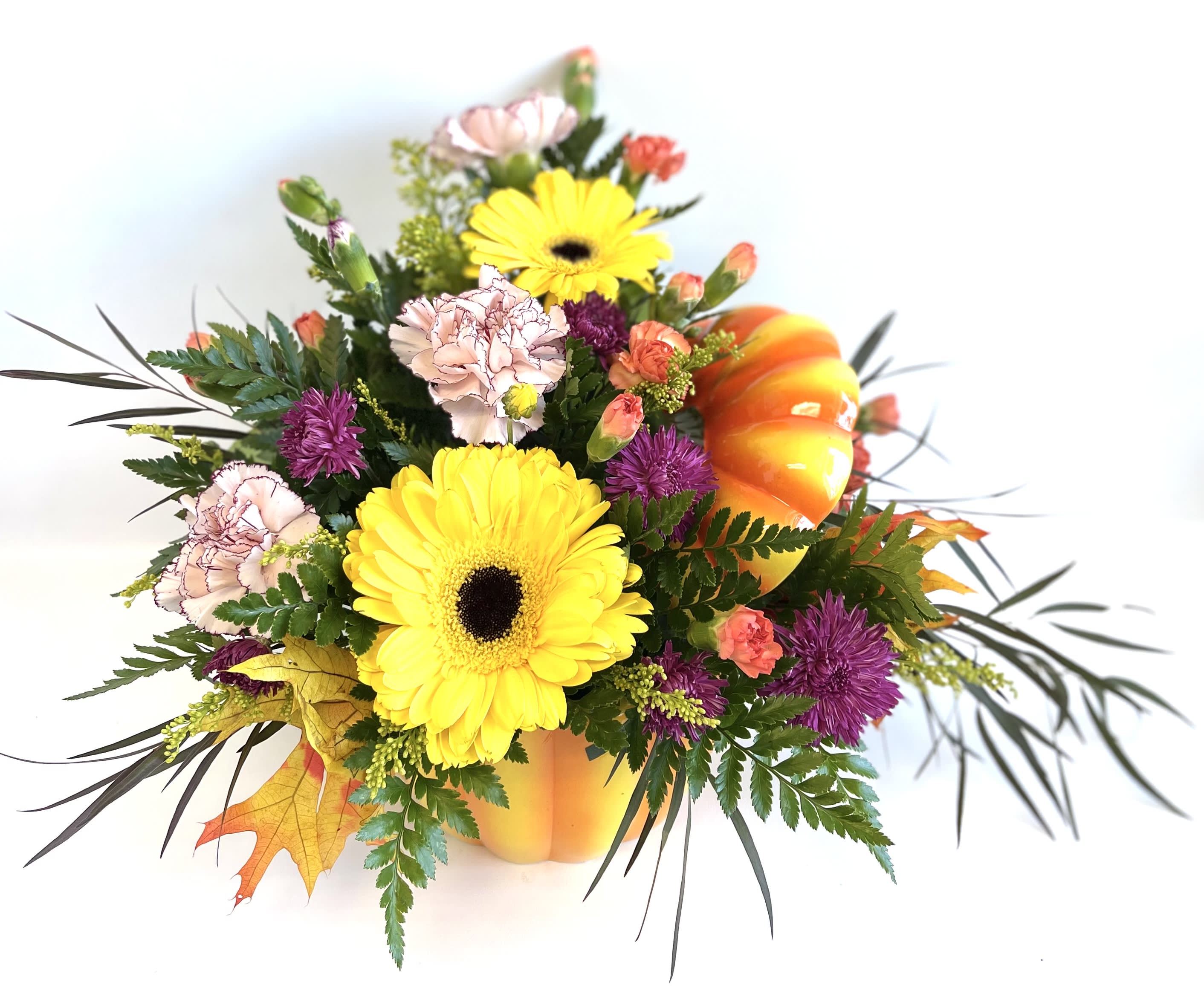 Mini Pumpkin Harvest Bouquet by Barb’s Flowers Mini Pumpkin Harvest Bouquet by Barb’s Flowers - A smaller version of the large pumpkin bouquet. This smaller ceramic pumpkin is filled with gerbera daisies, carnations, mums, mini carnations and fall and seasonal fillers and greens.
