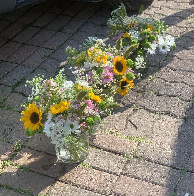 Summer 35 Summer 35 - Step into a world of sunshine with our green, white, and yellow summery flower arrangements. Embrace the warmth and joy of the season as these vibrant blooms infuse your space with a burst of color and cheer. Let nature's refreshing palette transport you to sun-kissed gardens and a blissful summer ambiance. Due to the availability of certain flowers, substitutions might occasionally be necessary to assemble your arrangement.