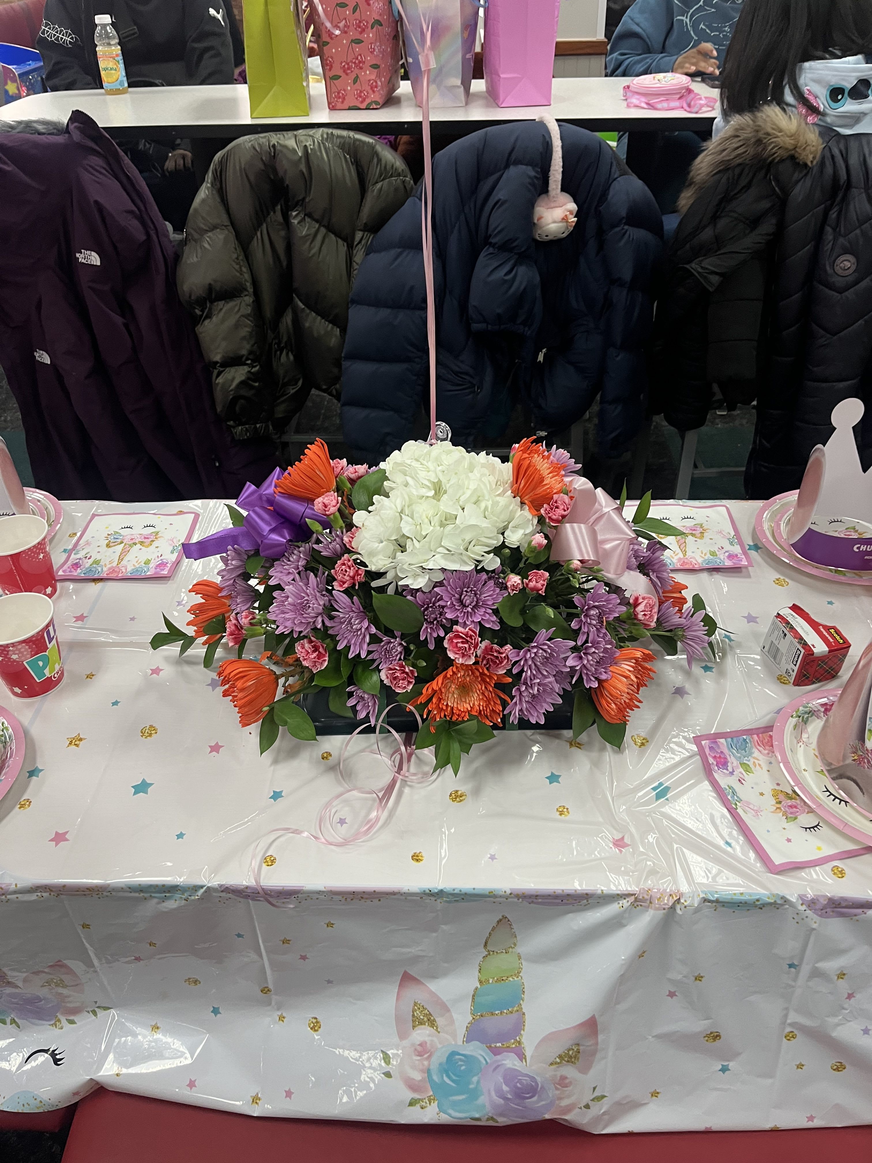 Any occasion centerpiece  - This lovely arrangement sits a fresh beautiful hydrangea flower in the middle of an arranged flower display that’s encourages love and laughter in the home 