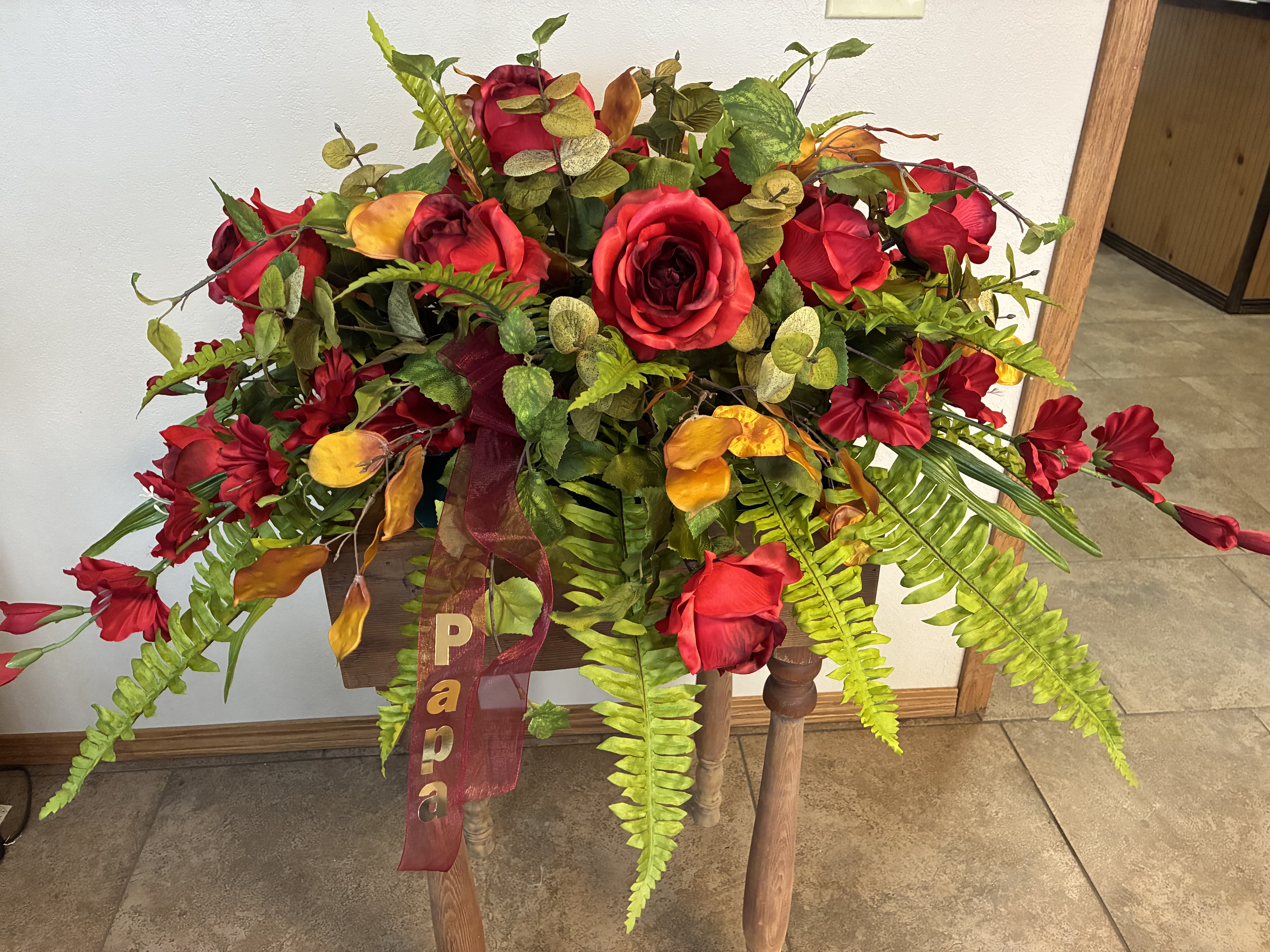 Silk Flower Casket Spray Silk Flower Casket Spray - Pay your respects with a divine mix of silk blossoms combined with greenery in this classic Silk Flower casket spray. A lovely way to express hope and sympathy. Reusable and keepsake.