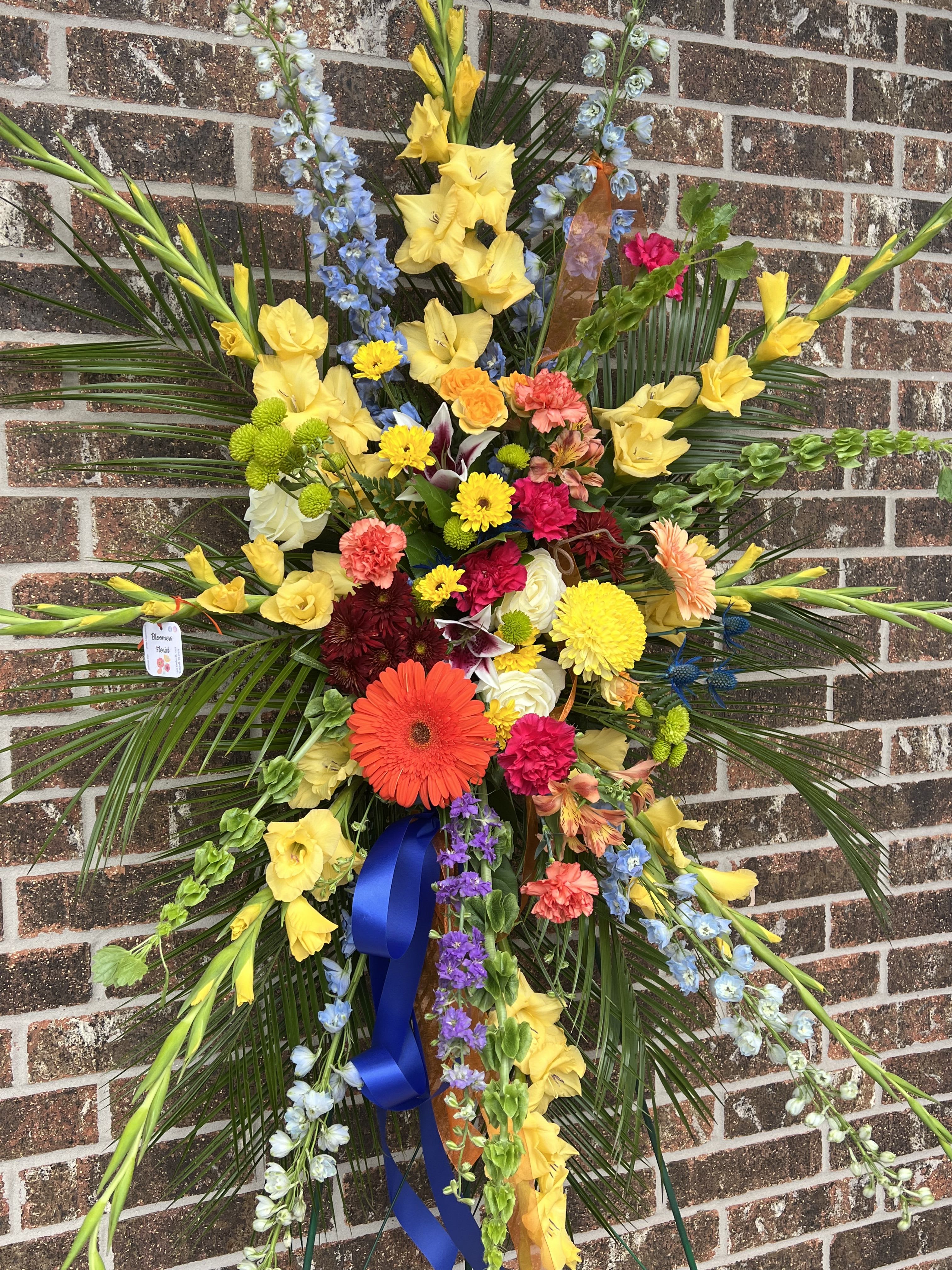 Colorful Expressions  - Standing easel spray designed like your traditional spray with pops of all colors. 