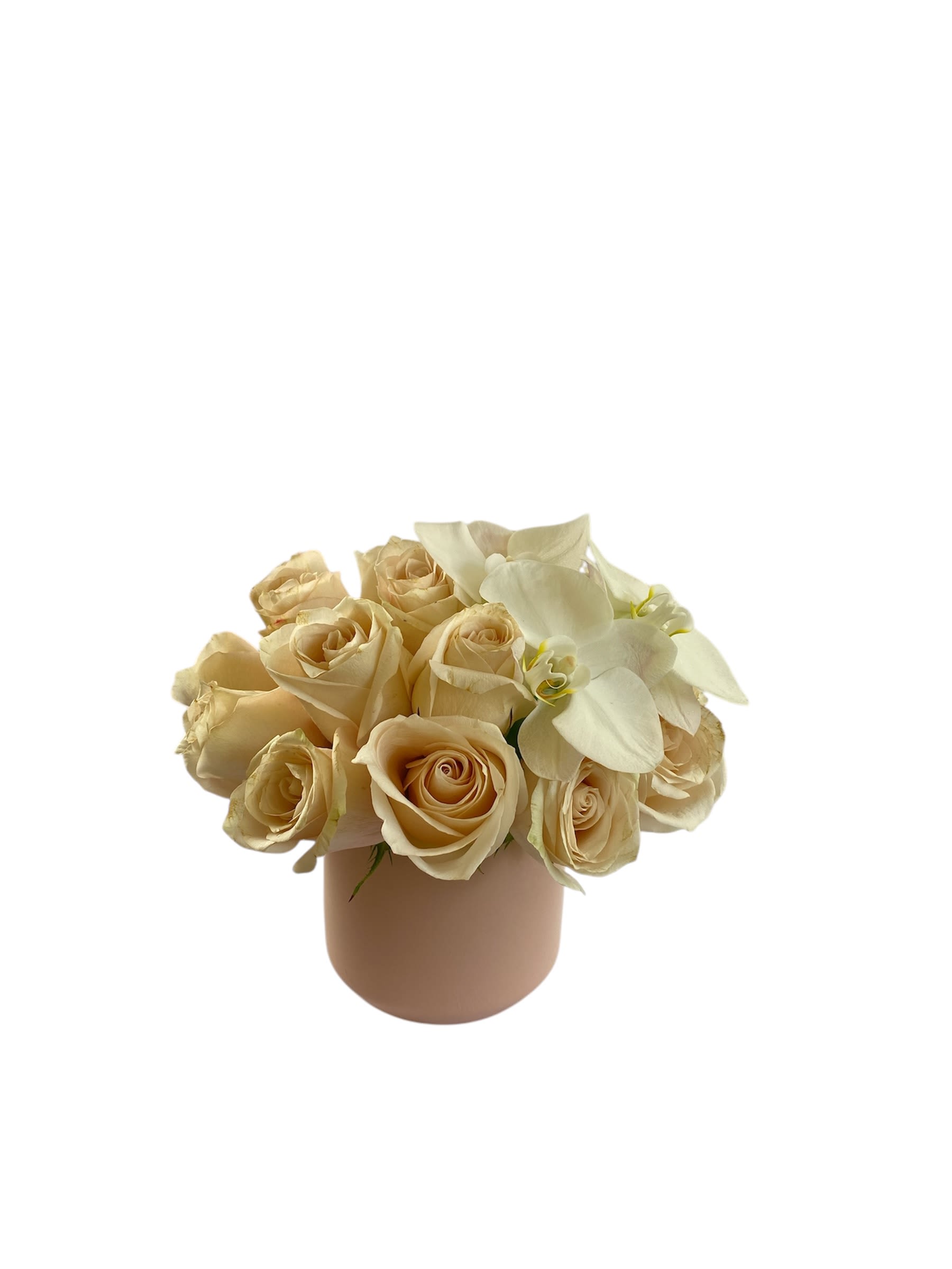 You &amp; Me - A cluster of cream colored roses with a touch of white phalaenopsis in a pink ceramic vase.