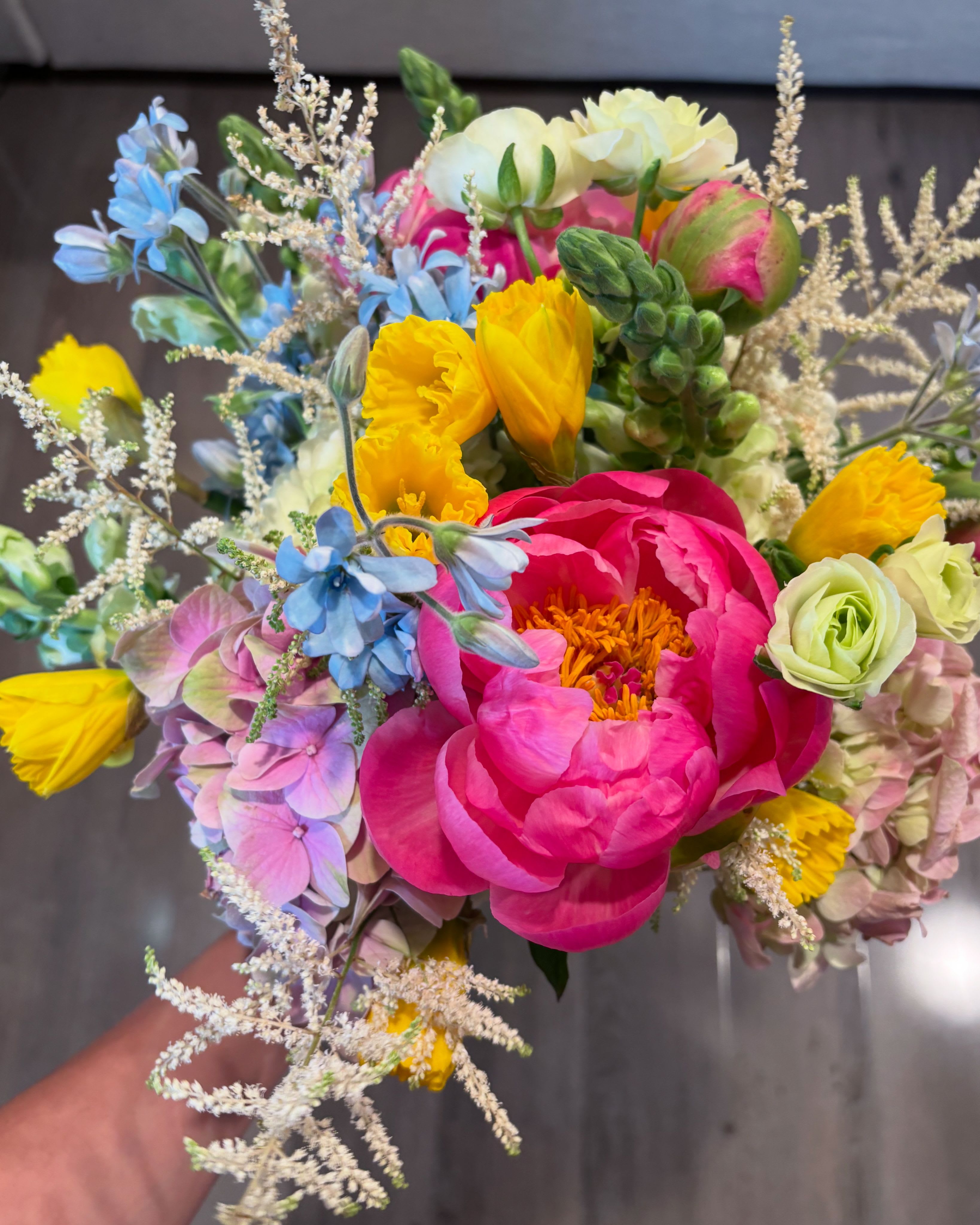 Radiant Floral Dream Radiant Floral Dream - Discover "Radiant Floral Dream" a bridal bouquet crafted for those who seek the extraordinary. This arrangement features a selection of exclusive, seasonal flowers, elevating any occasion with its sophisticated beauty. From garden roses to peonies and rare orchids, each bloom is carefully chosen to create a unique floral masterpiece. Additionally, it can be transformed into a stunning centerpiece adding more flowers to adorn spaces with a touch of sublime elegance.