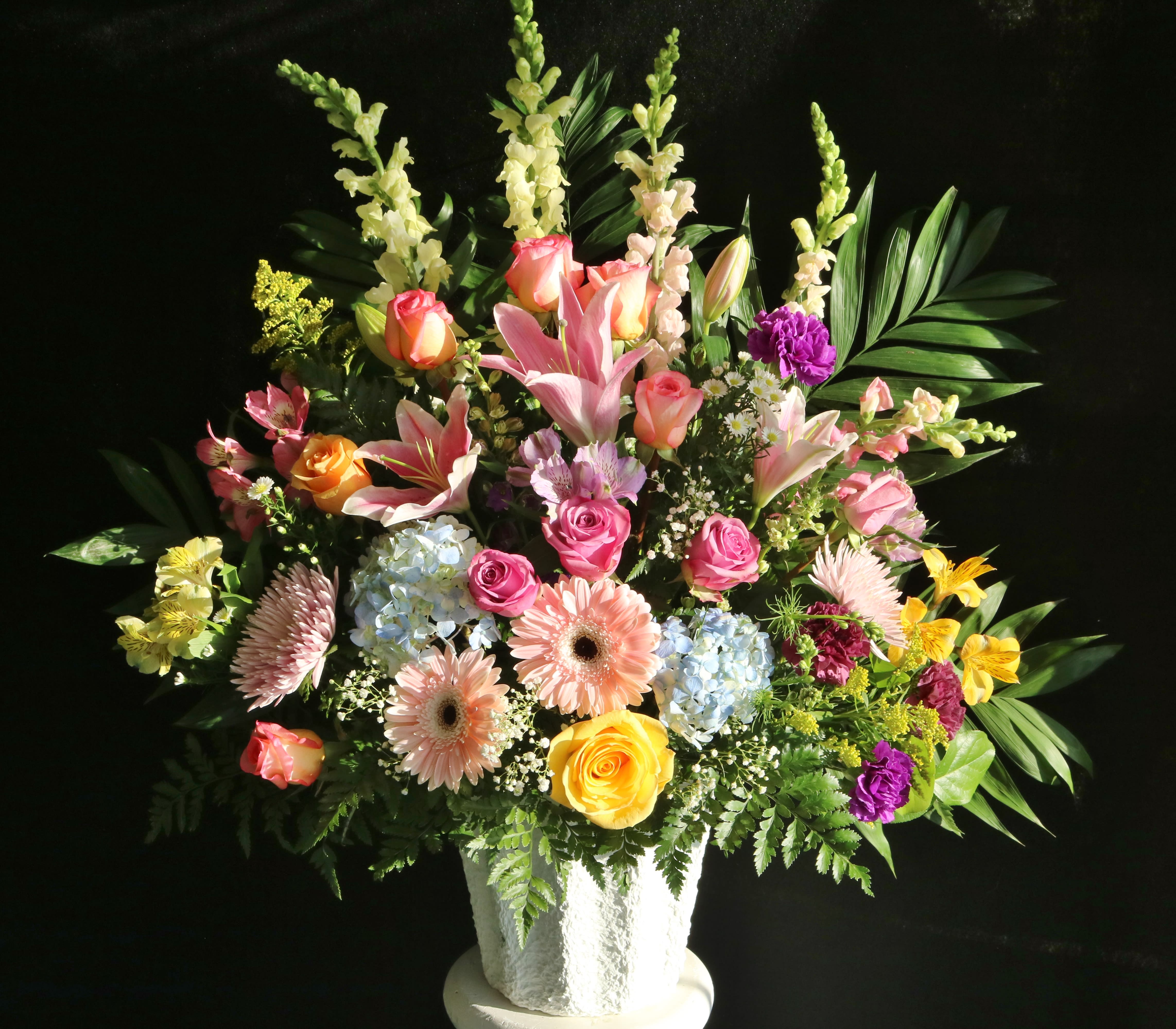 Cheerful Basket Cheerful Basket - mixed flowers in a rainbow of colors arranged in a mache basket