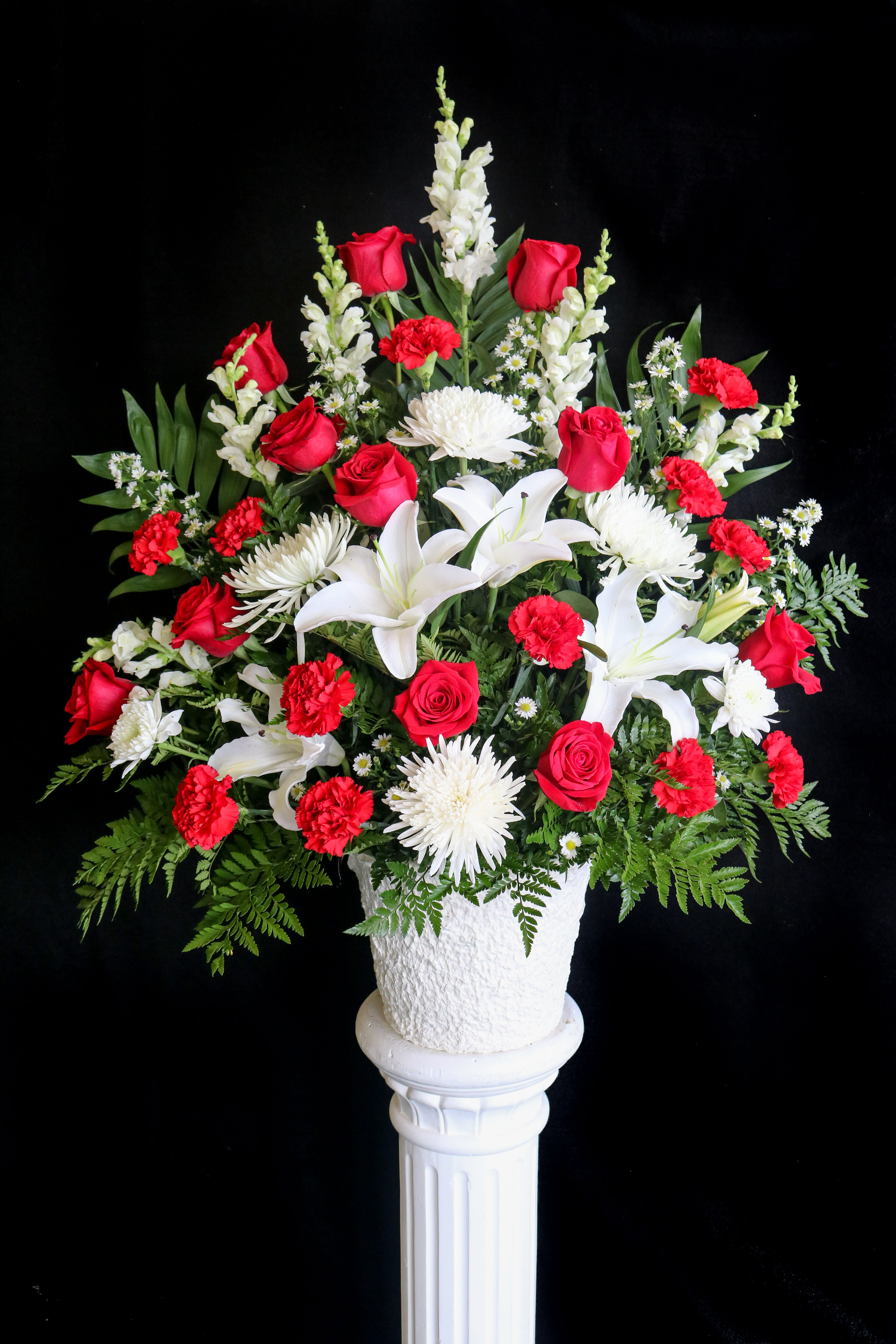 Red and White Basket Red and White Basket - a tall, sophisticated arrangement of red and white in a mache basket