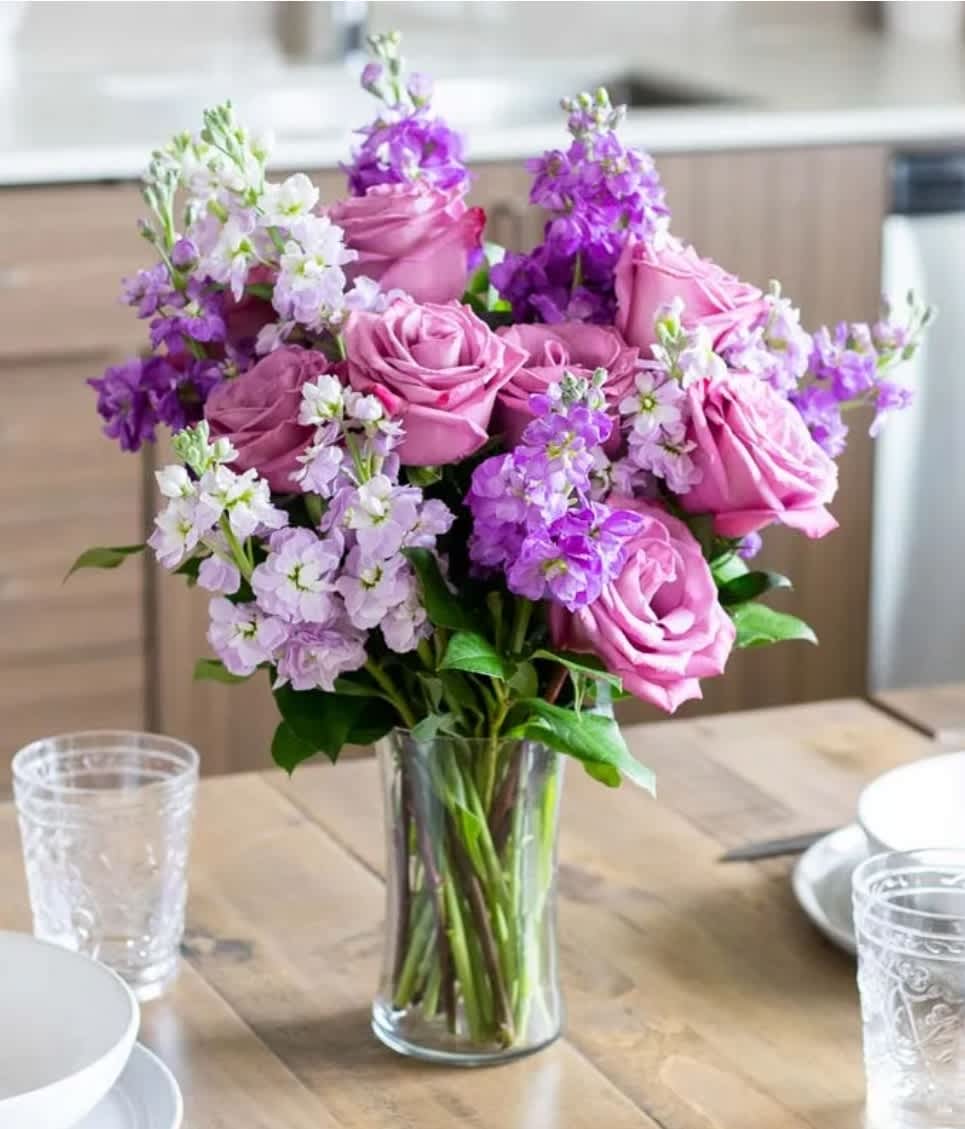 Lavender Bouquet  - Beautiful lavender Roses with Stock with  in clear Vase we carry to you loving Room