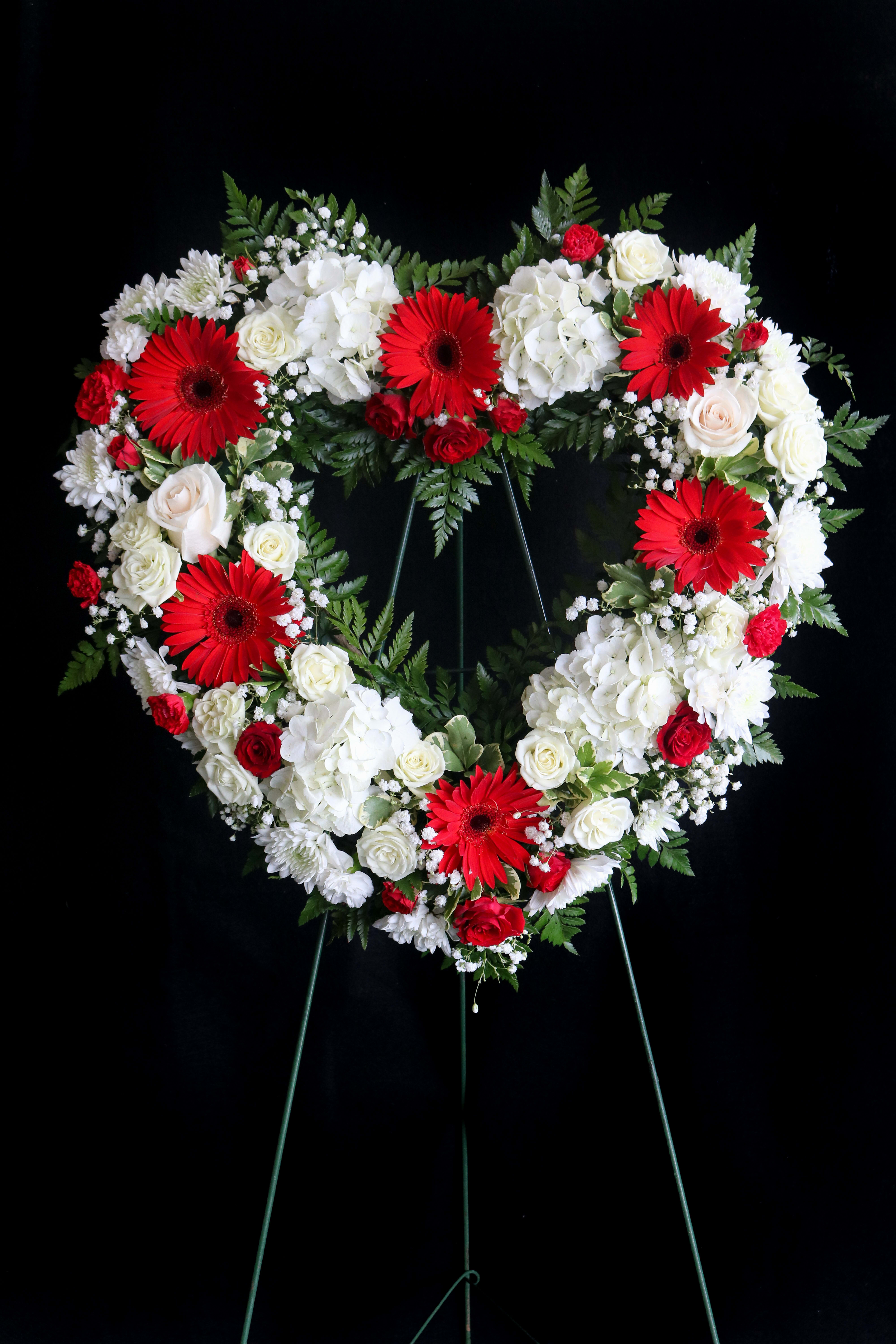 Red &amp; White Open Heart - 18 inch open heart featuring hydrangeas, gerbera daisies, roses, and other elegant flowers. The premium size is a 24 inch design.