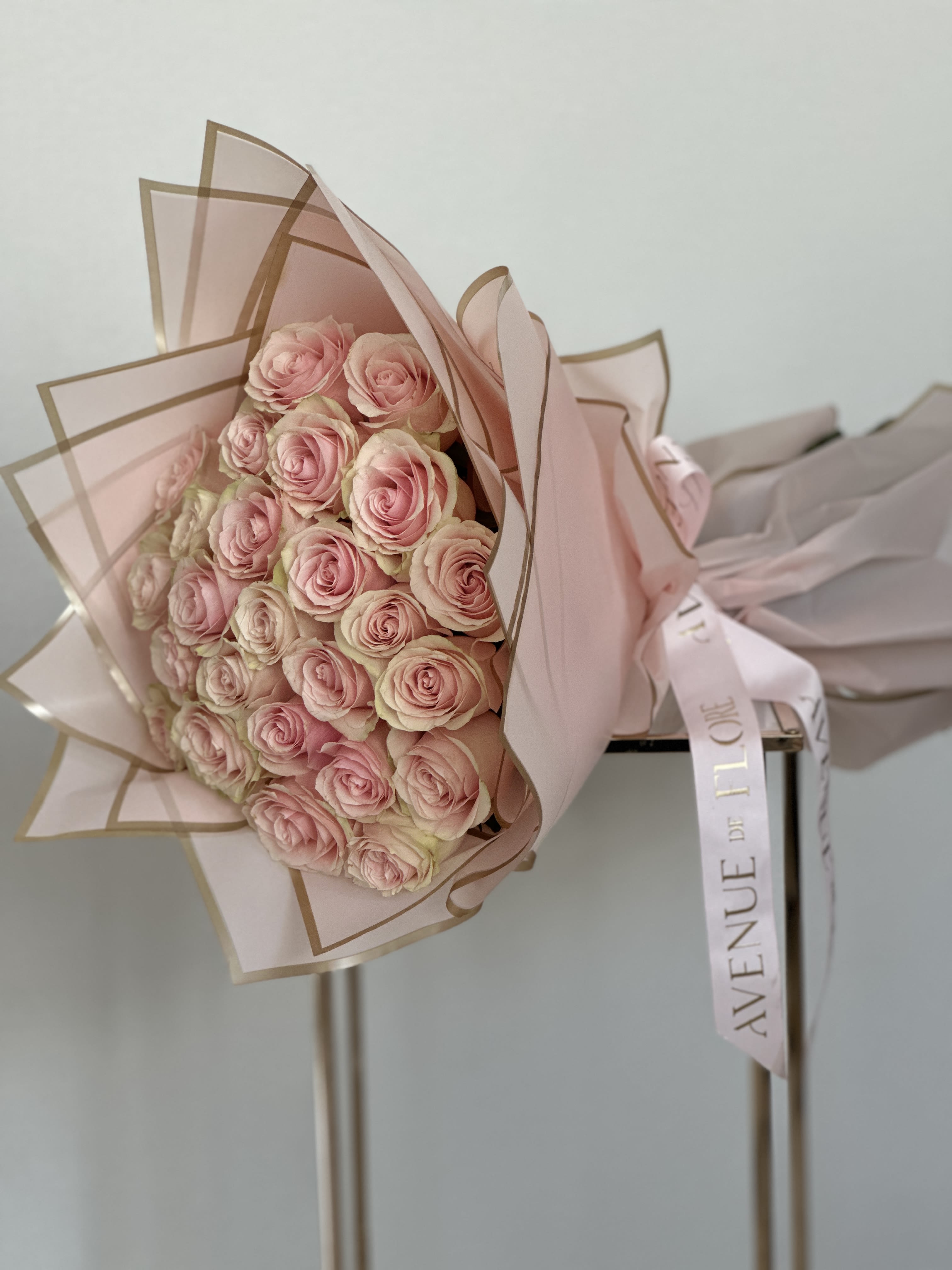 Light Pink Rose Bouquet - Introducing a bouquet of unparalleled elegance and sophistication. The perfect gift to elevate any occasion, from intimate gatherings to grand celebrations. 