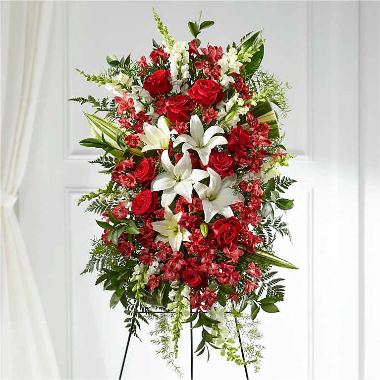 Everlasting Memorty Standing Spray - Our Everlasting Memory Standing Spray combines timeless hues with unique blooms to honor the life of the one you have lost. Each lily, rose and snapdragon are elegantly curated to share your messages of peace, sympathy and love. Rose Snapdragon Lily Alstroemeria