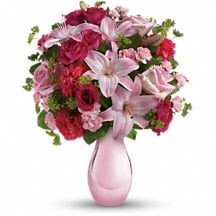 2corazones blush bouquet 2corazones blush bouquet - Make them blush with this lovely bouquet. Light and hot pink roses and light pink asiatic lilies accent our elegant Pink Reflections vase.