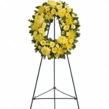2corazones eternal 2corazones eternal - This lovely medley of yellow flowers so beautifully arranged in a standing wreath is a reminder of the joy of life even during the darkest of times. It is an expression of hope that the family will deeply appreciate and long remember.