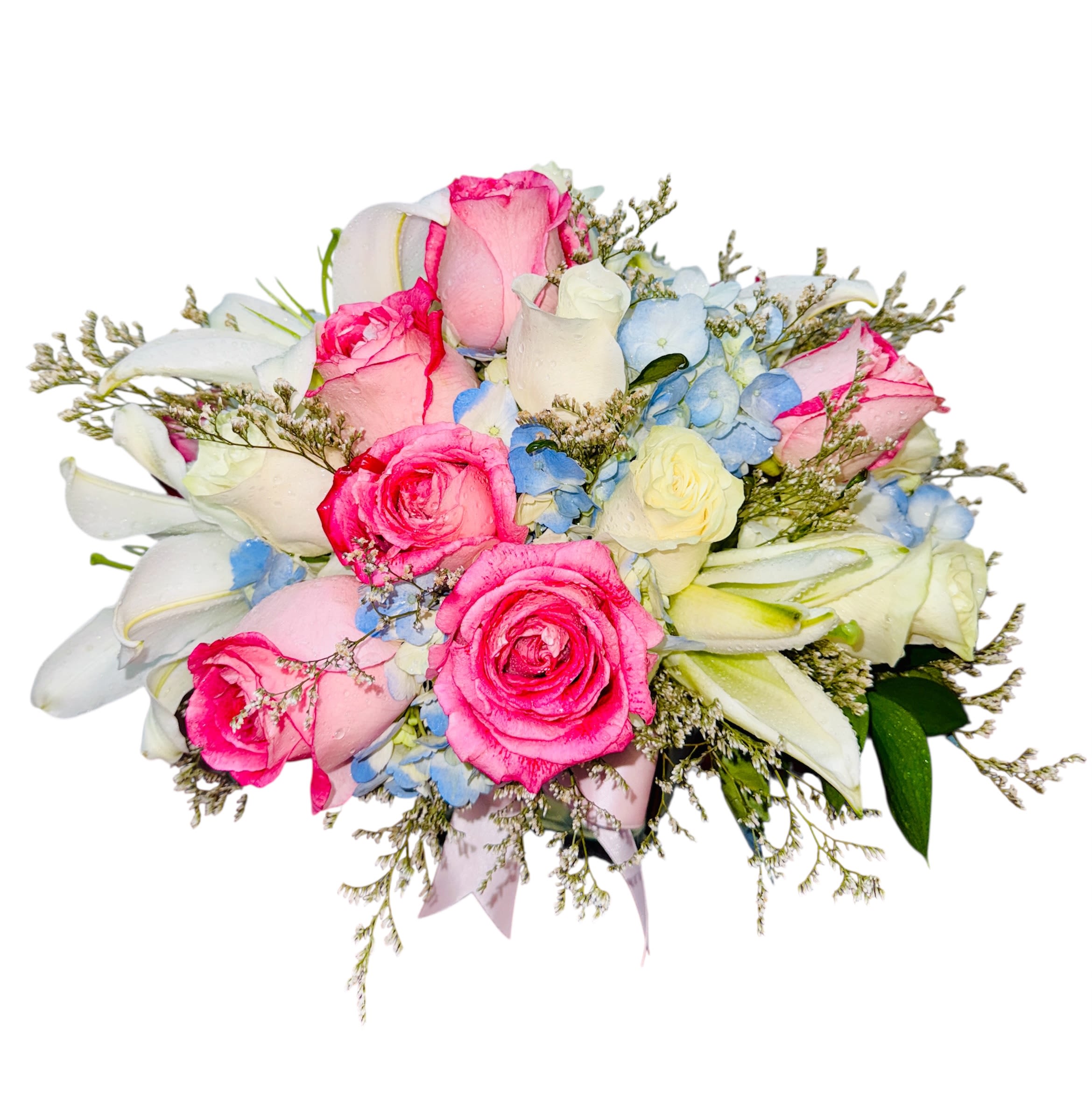 Azure Whisper - This elegant and romantic bouquet features a delicate harmony of pink and white roses, creamy lilies, and soft blue hydrangeas, thoughtfully accented with lush greenery and wispy white fillers. The arrangement evokes the serenity of a spring morning and the soft murmur of heartfelt emotions—perfect for celebrations, heartfelt apologies, or simply to brighten someone’s day. Its graceful color palette makes it a versatile gift with timeless 