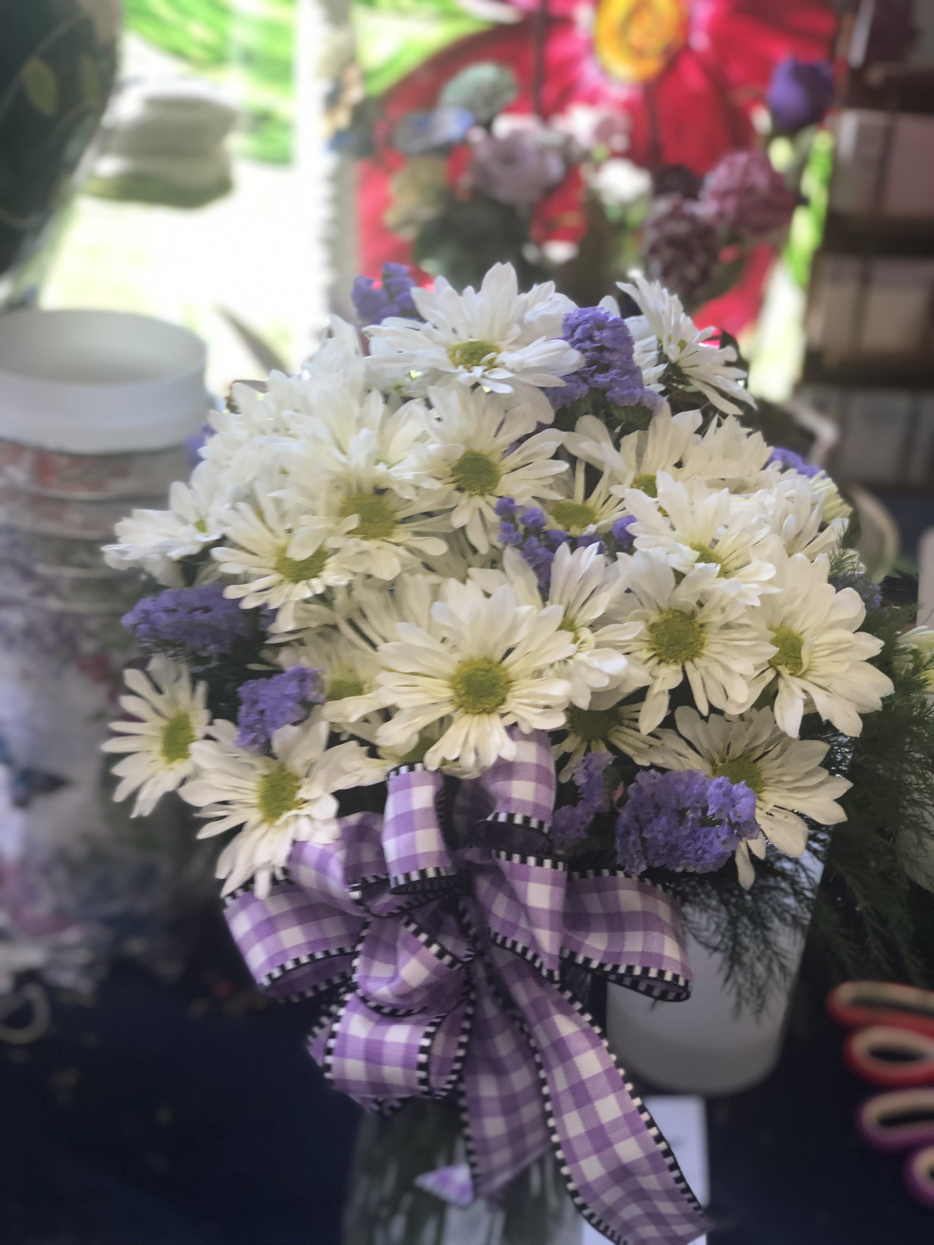 Daisy Darling Daisy Darling - What is more darling than a vase full of daisy's - we will use the freshest color we have in stock unless noted otherwise in the special instructions *ARRANGEMENT IS ONE-SIDED*