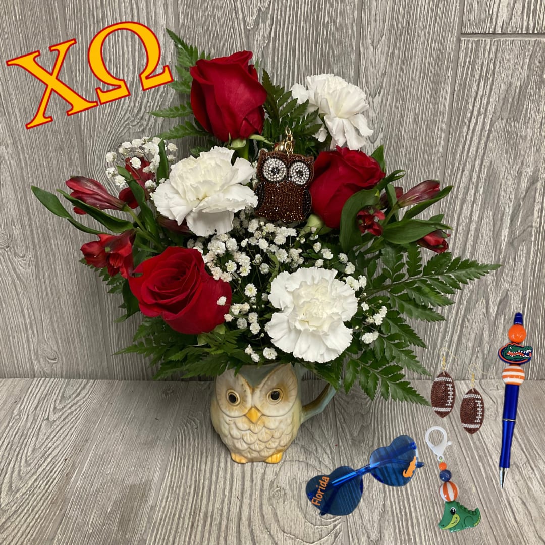 Chi Omega Gift Set - Chi Omega Gift Set! Perfect for your Chi Omega daughter or sister.  Included in Gift Set -Floral Arrangement -Rhinestone Owl Keychain -1 Pair of Rhinestone Football Earrings -1 Assorted Gator Pen -1 Pair of Assorted Gator Sunglasses -1 Assorted Gator Keychain