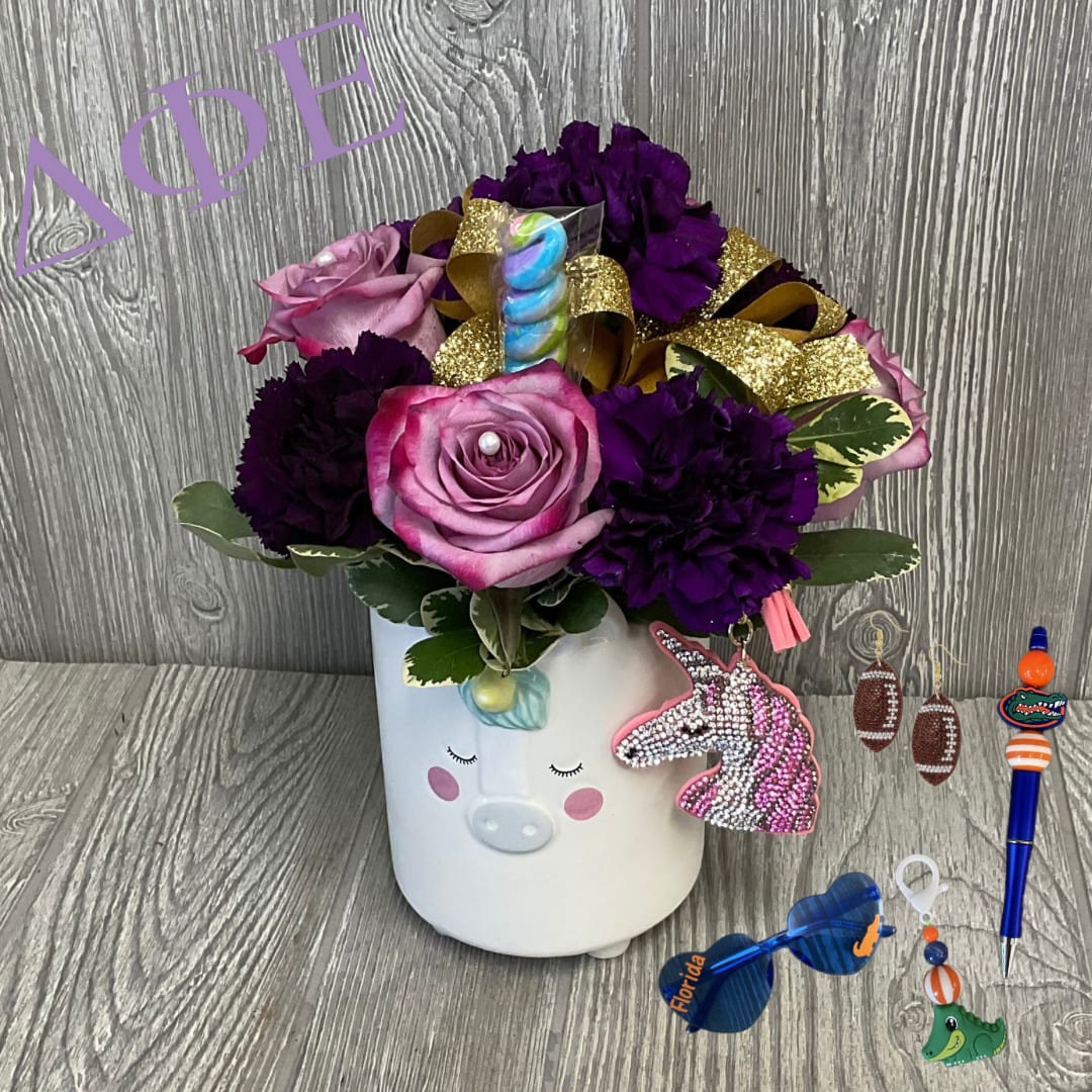 Delta Phi Epsilon Gift Set - Delta Phi Epsilon Gift Set! Perfect for your Delta Phi Epsilon daughter or sister.  Included in Gift Set -Floral Arrangement -Rhinestone Unicorn Keychain -1 Pair of Rhinestone Football Earrings -1 Assorted Gator Pen -1 Pair of Assorted Gator Sunglasses -1 Assorted Gator Keychain