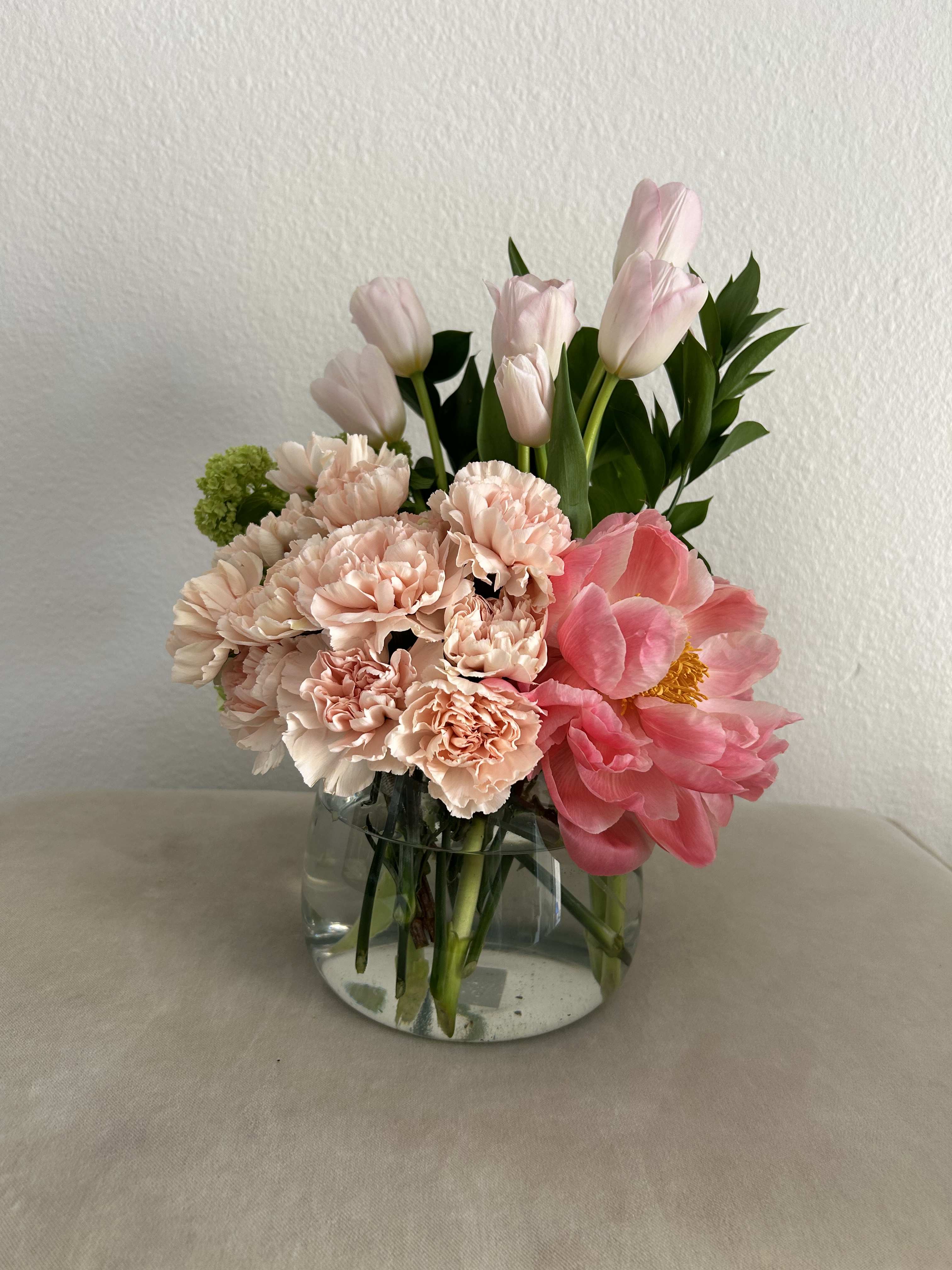 Gloss Gaze - This exquisite bouquet is the ultimate gift for anyone special, featuring a delightful arrangement of tulips, peonies, and hydrangeas in a charming vase. Perfect for expressing love and admiration with every bloom. - Aliso Viejo Florist