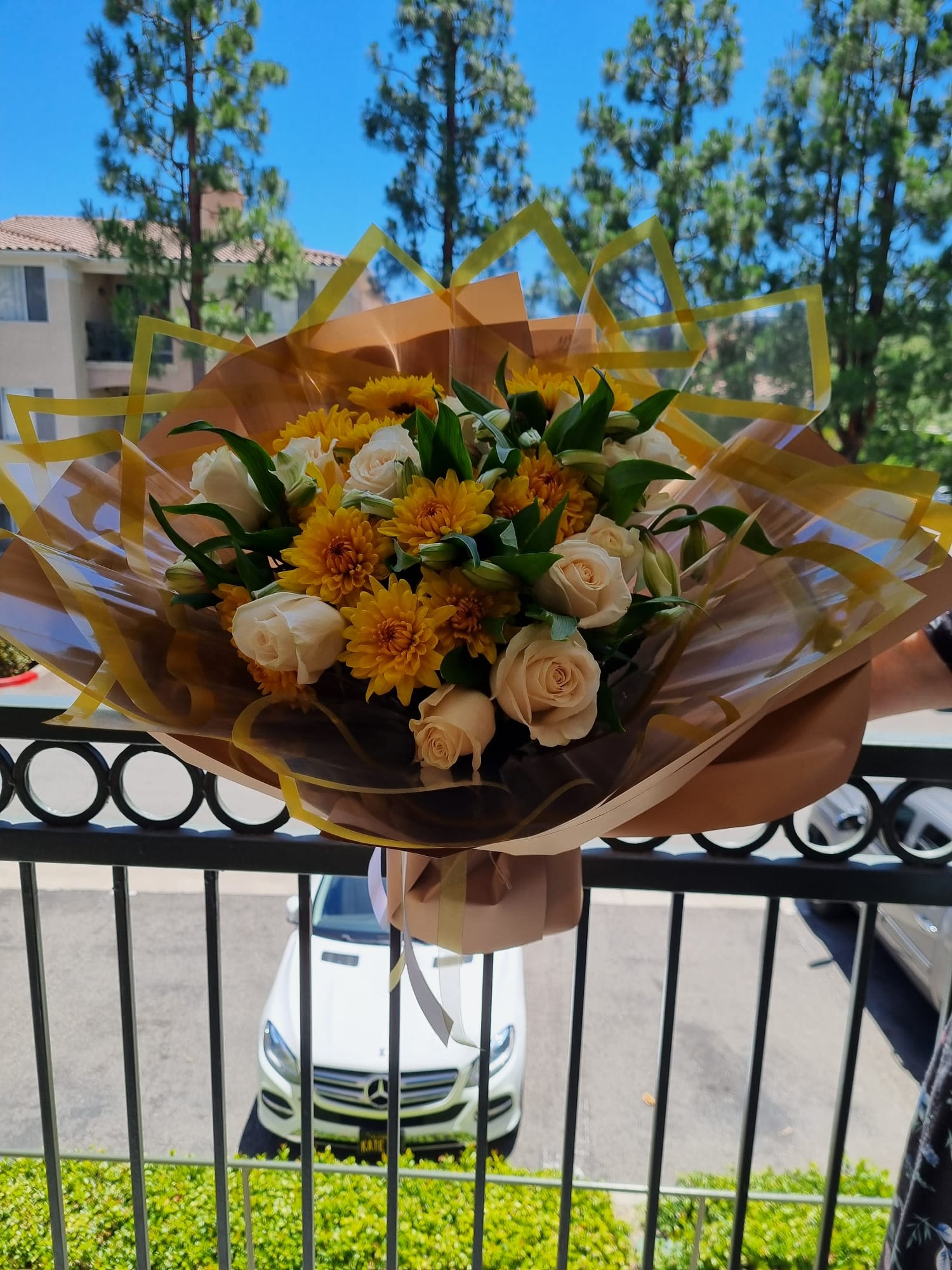Ivory Whisper - Ivory Whisper is a timeless bouquet featuring elegant white roses nestled among lush, fresh greenery. It comes with one dozen roses, but you’re welcome to customize the quantity to suit your occasion. While shown here in white and yellow this arrangement can be made with any rose color of your choice—just let us know your preference. - Aliso Viejo Florist