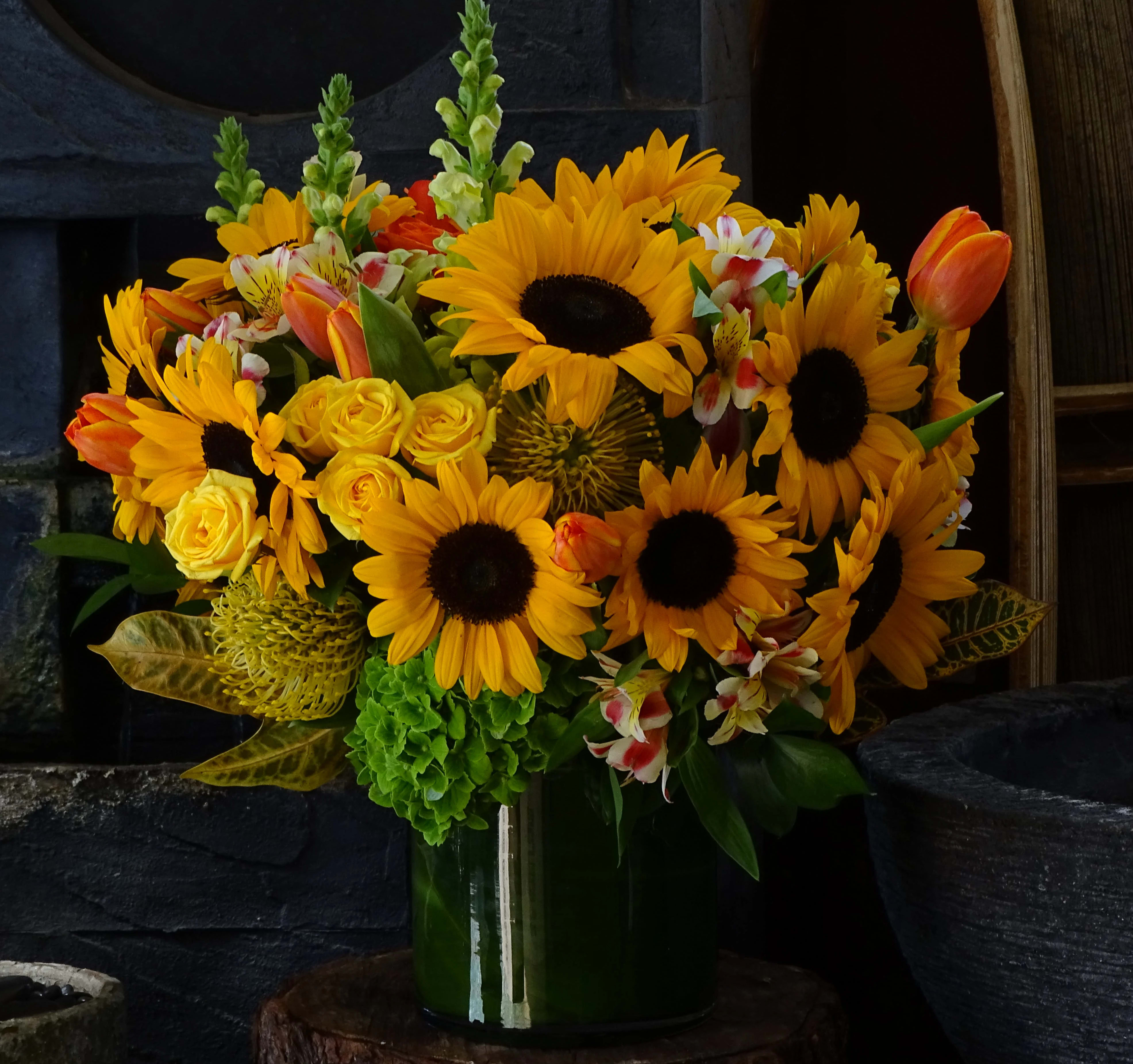 Shine  - Sunflowers, Hydrangea, Rose, Protea, Tulips,..in glass vase.