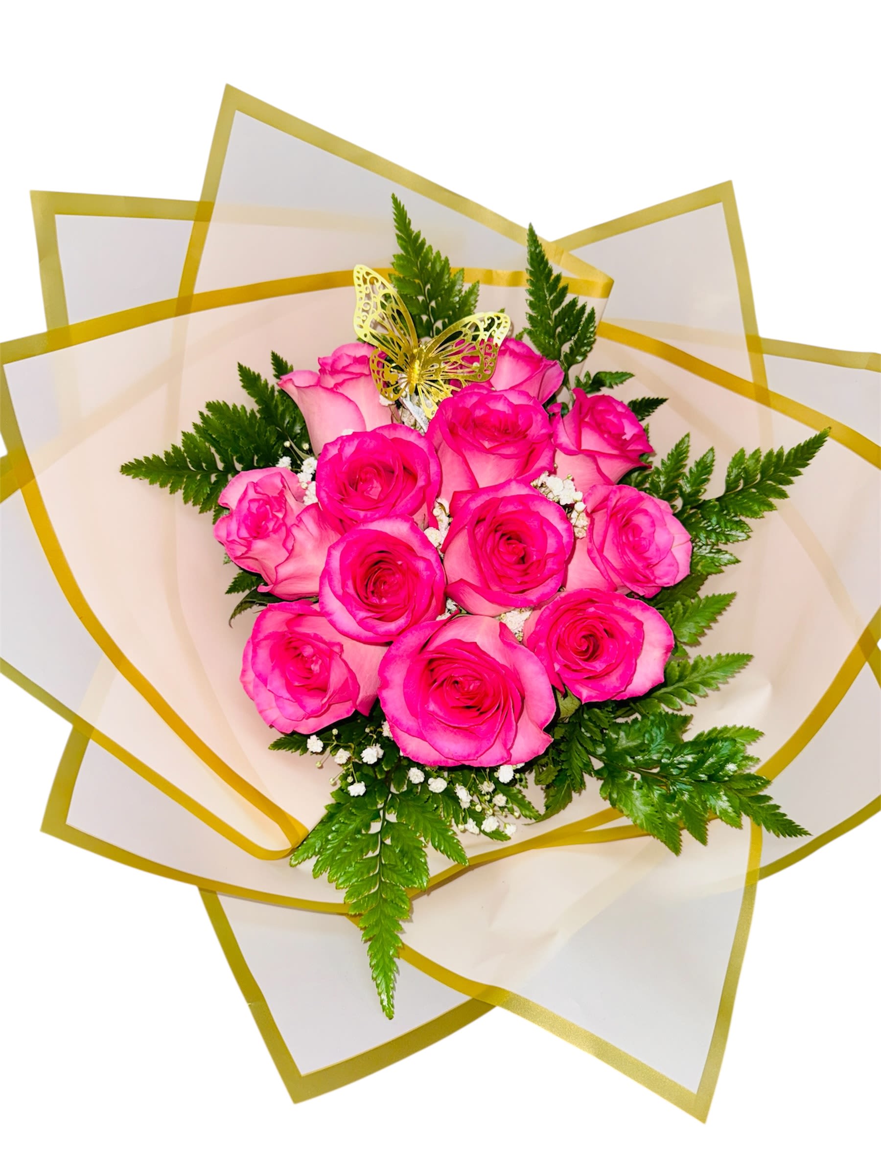 Blush Wing Elegance (25 roses) - This soft yet striking bouquet offers a sweet fusion of romance and grace. Nine vibrant pink roses bloom in full, gently cradled by rich green ferns and tiny white filler blossoms—creating both texture and harmony. Wrapped in crisp white paper with a subtle golden trim, the arrangement exudes polished charm. A golden butterfly nestled among the petals adds a dreamy, whimsical accent, symbolizing transformation and tenderness. It’s the kind of bouquet that speaks in gentle tones but leaves a lasting impression.