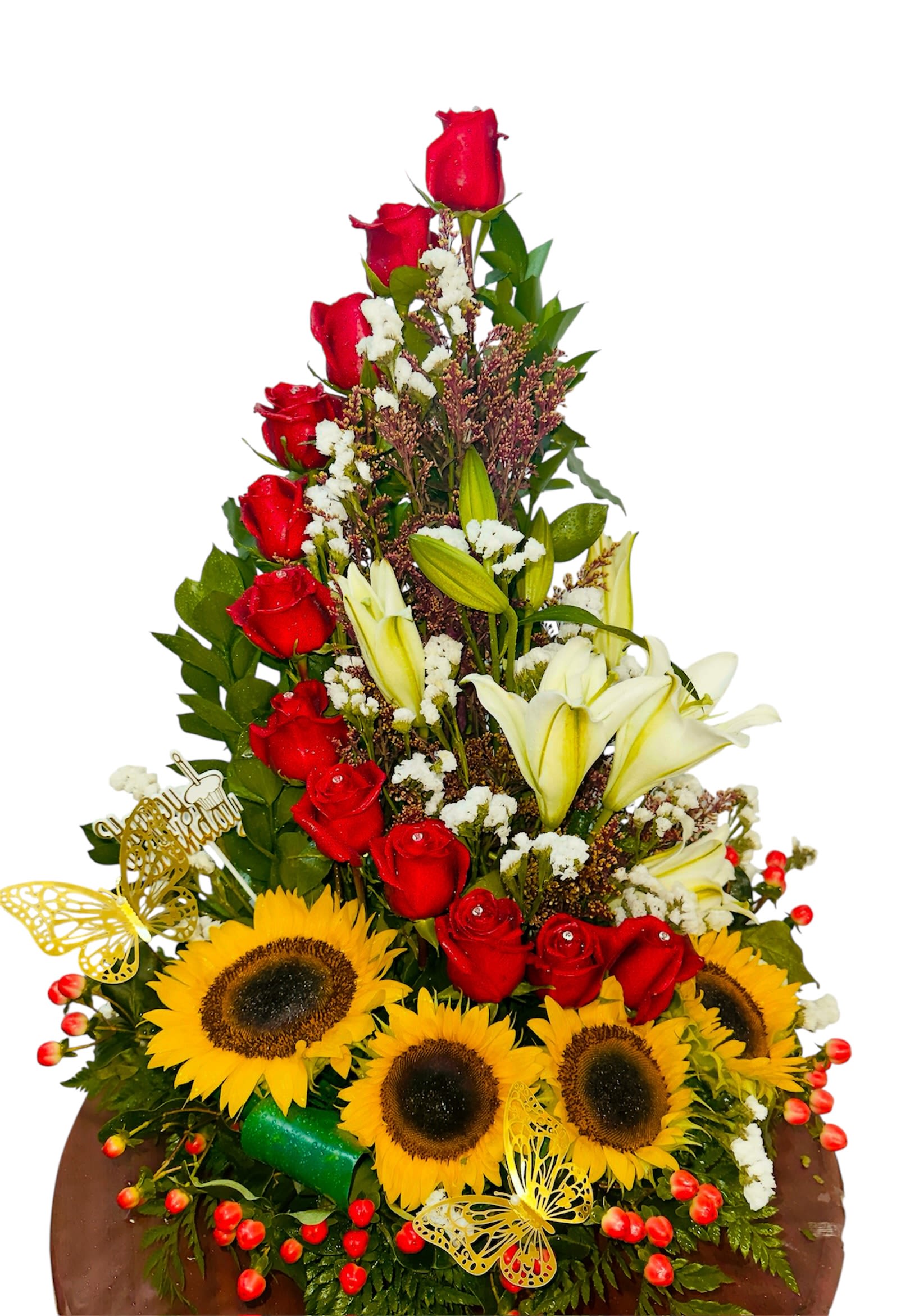 Butterfly Birthday Bloom - This vibrant bouquet sings with joyful celebration and natural charm. Bold red roses, creamy white lilies, and radiant sunflowers form a cheerful base, accented with white filler blooms, glossy green leaves, and playful red berries. Two yellow butterflies add whimsical grace, hovering near the “Happy Birthday” sign that quietly anchors the festive mood. The arrangement feels like a lively garden party wrapped in gratitude—ideal for birthdays full of warmth and heart.