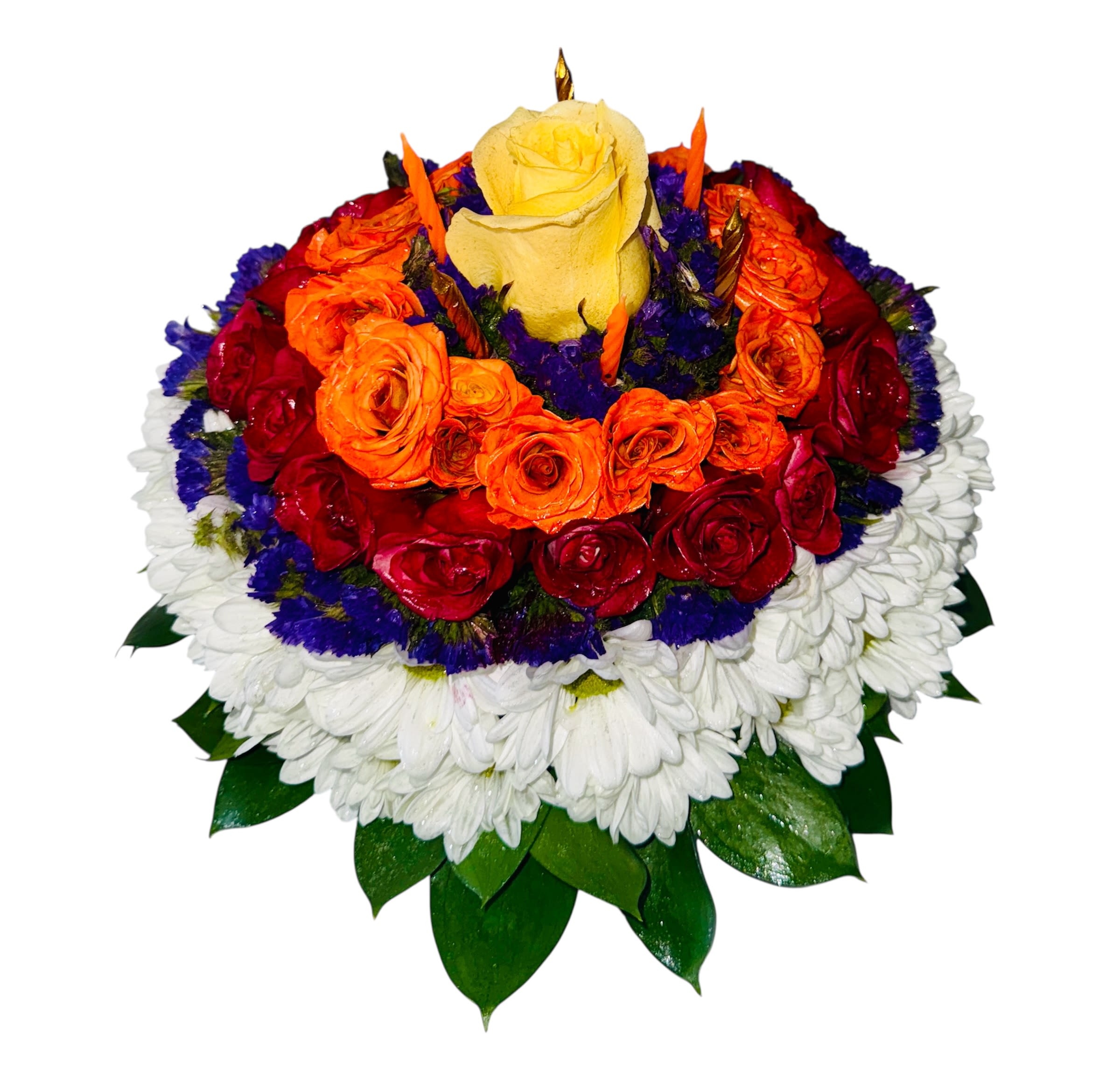 Birthday Cake - This striking centerpiece radiates beauty through a perfectly orchestrated gradient of blooms. At its core, a golden-yellow rose shines like morning light, encircled by tangerine, crimson, and plum-colored roses that cascade outward like a painter’s palette. The outer layer of soft white petals, possibly chrysanthemums, creates a halo effect—evoking peace and purity. Lush green leaves provide a grounding finish, making the entire composition feel like a celebration of nature’s color symphony.  This piece would make a captivating statement for elegant events, gratitude gifts, or brand displays that emphasize thoughtful design and vivid emotion.
