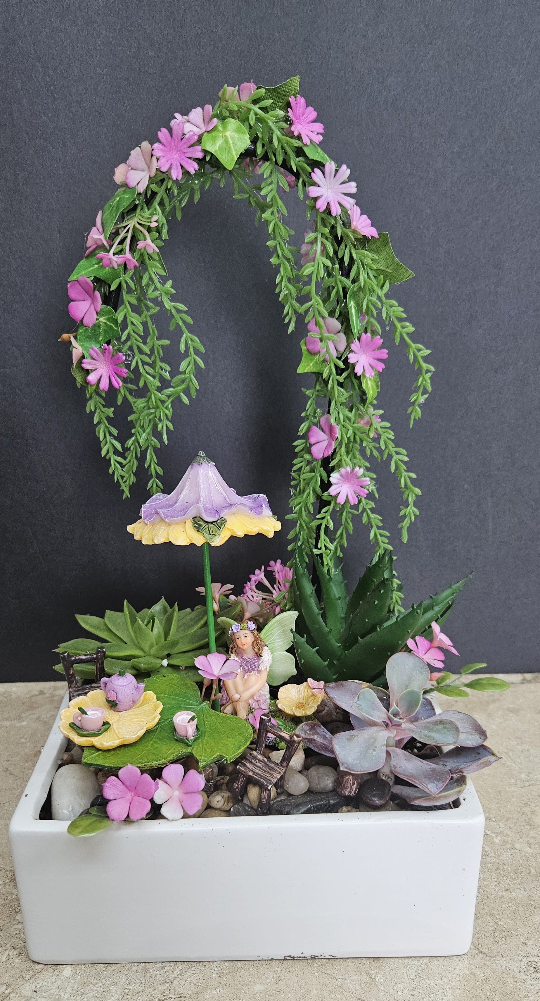 Succulent Fairy Garden - Beautiful Succulents with super cute fairy tea party set up