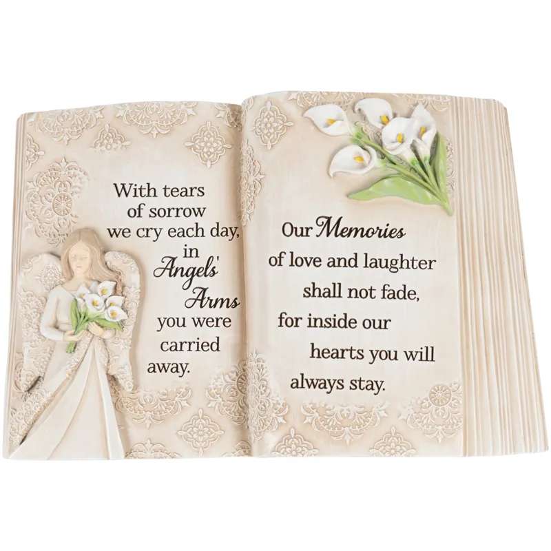 Angels' Arms Memorial Book Angels' Arms Memorial Book - This memorial book is made of hand-painted resin with an attached metal stand. This piece is good for both indoor and outdoor use!