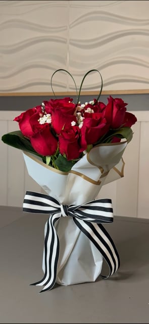 Pure Love - This is the perfect way to let someone know you love them.  Pictured here are red roses, but any color rose can be used.