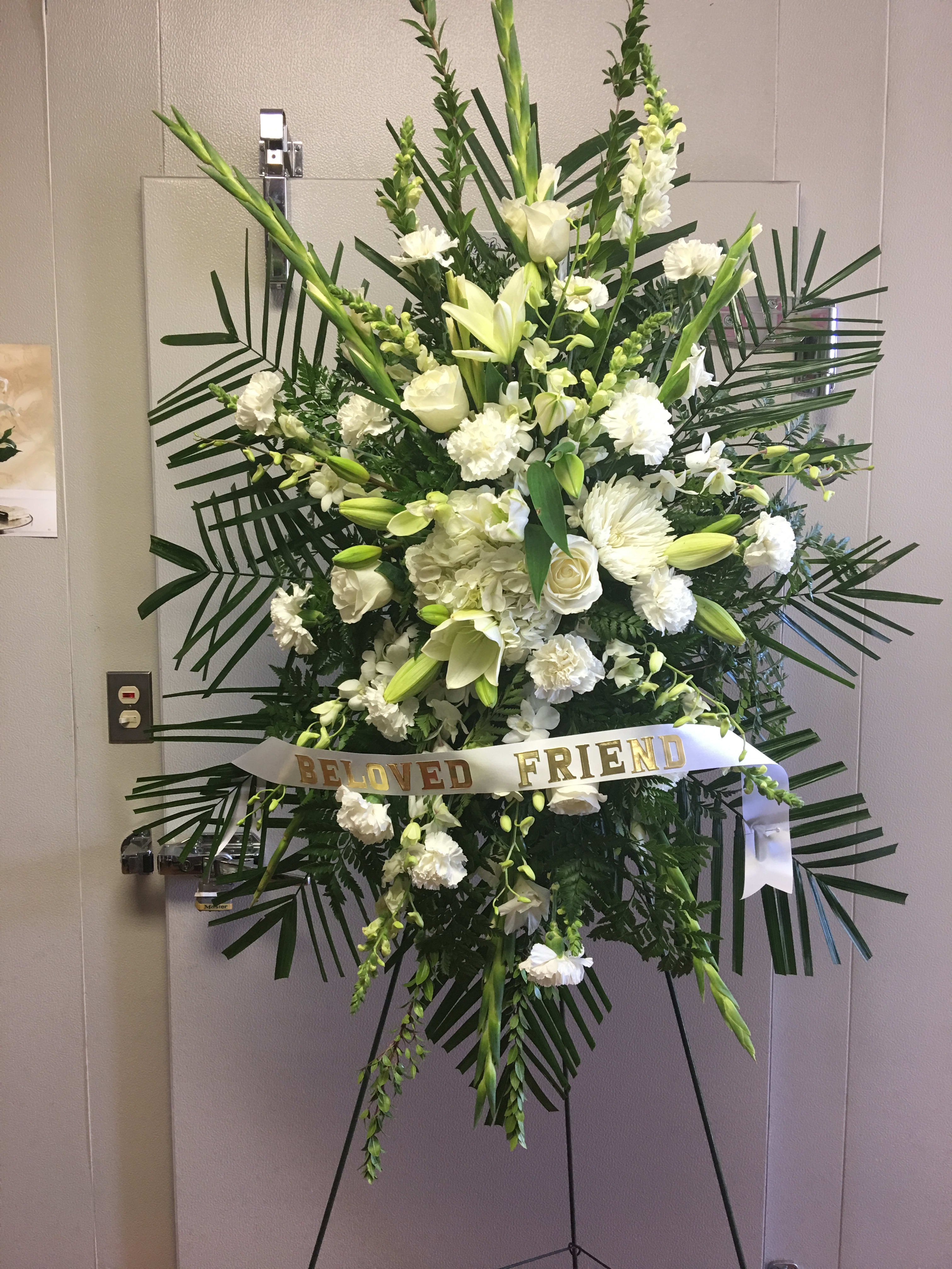 Elegant white spray - Mixed premium flowers in white! Very elegant!