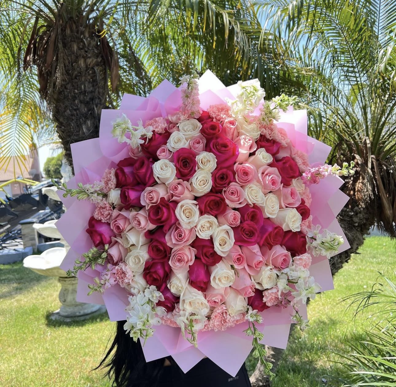 Bouquet blooming in love (100 roses ) Bouquet blooming in love (100 roses ) - Make your special date bloom with this beautiful bouquet made up of 100 shades roses, light pink, and hot pink, pink carnations and pink and white stock around the bouquet, wrapping papers in pink colors and a bow with a crystal brooch.available every day
