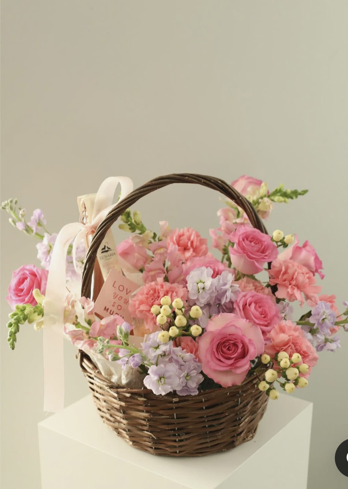 Mixed flowers  Arrangement in Basket - fresh country flower basket! Pretty blooms of pink, Pink Daisies, purple nestle happily inside a natural gift basket.