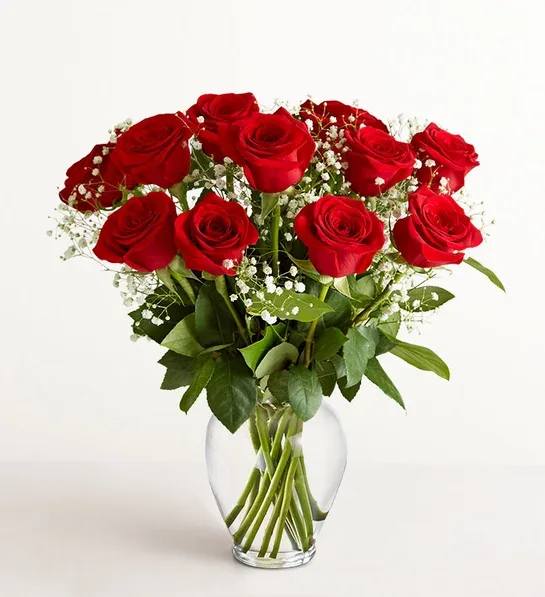 One Dozen Red Roses - An impressive presentation of two dozen fragrant, long-stemmed red roses accented with greenery is a classic gift for Valentine’s Day, a romantic birthday, an anniversary or as a memorial tribute. It’s a traditional gift that symbolizes love. Available in many colors.