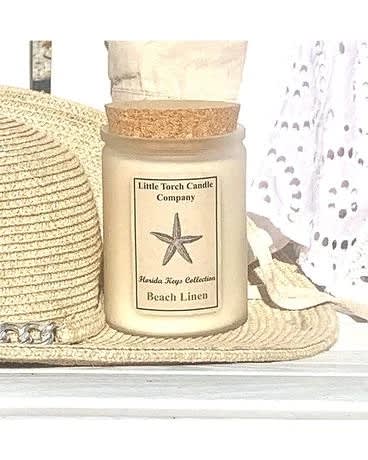 Beach Linen - &quot;Fresh laundry&quot; is how many customers describe this scent. Whether it be the fragrance of crisp linen while relaxing on the beach or line-dried sheets that await you for your slumber, Beach Linen is fresh and pure. This is a great fragrance for those who want to create a clean pristine atmosphere in their home. Note Profile: Top: Lemon, Apple, Ozone Middle: Jasmine, Cotton Blossom Base: Cedar, Ozone, Violet 