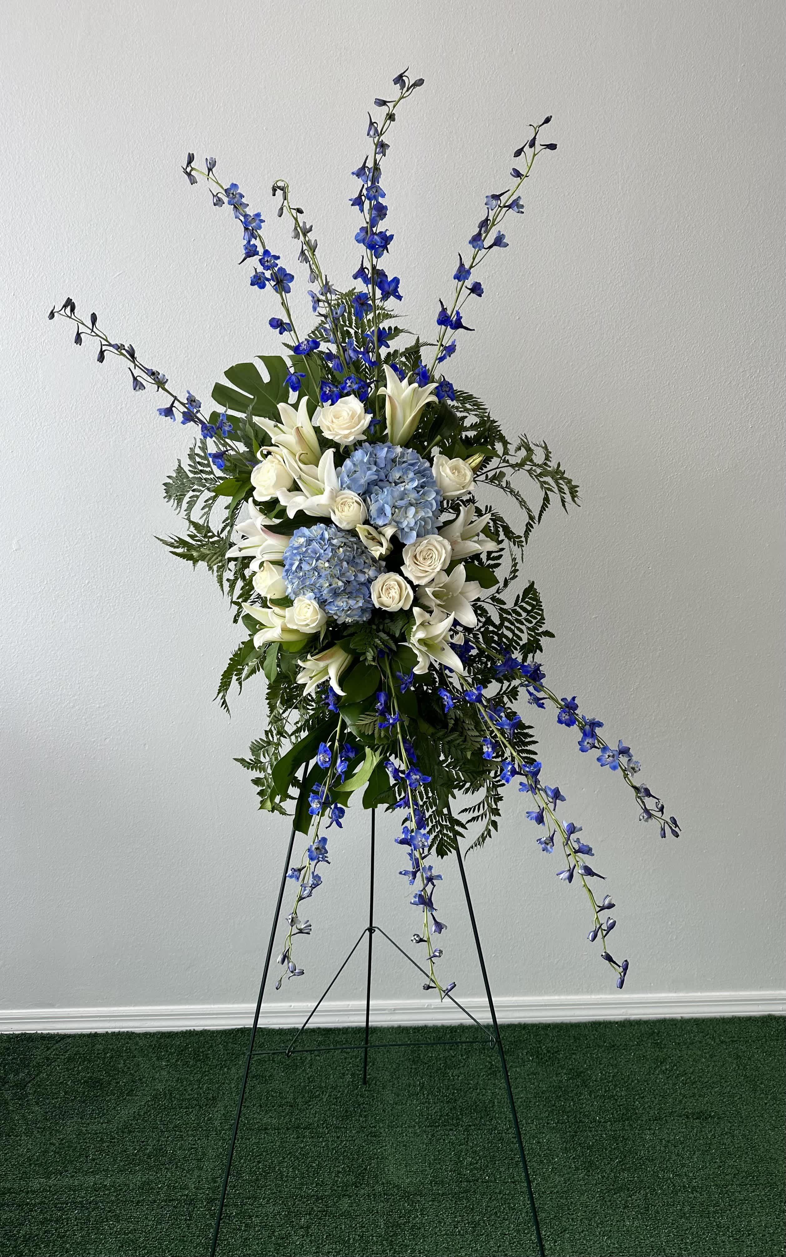Blue sky Blue sky - Standing Spray Flowers and color substitution might apply