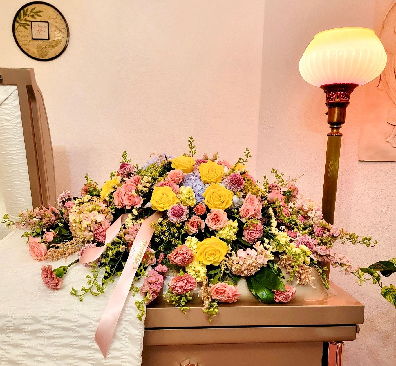 Stardust Serenity Spray Stardust Serenity Spray - Yellow roses with pink and blue hydrangea, buttercream stock, antique mauve carnations and scabiosa