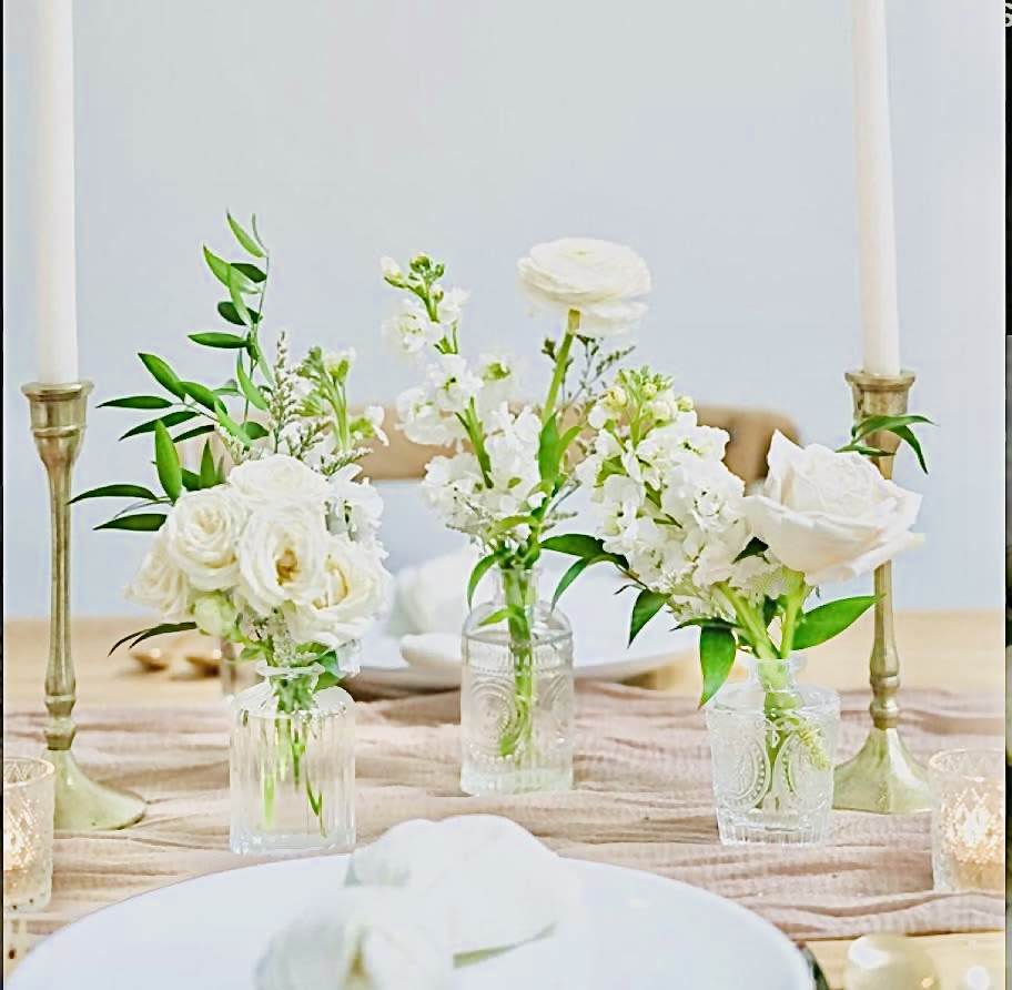 Soft - budvase trio - One of our lovely tablescape comes in soft flower color budvases. Please order in a week advance for budvase arrangement.   If you bring your own budvase, we charge only $25.   3 budvase- $105  6 budvase- $210 9 budvase- $315