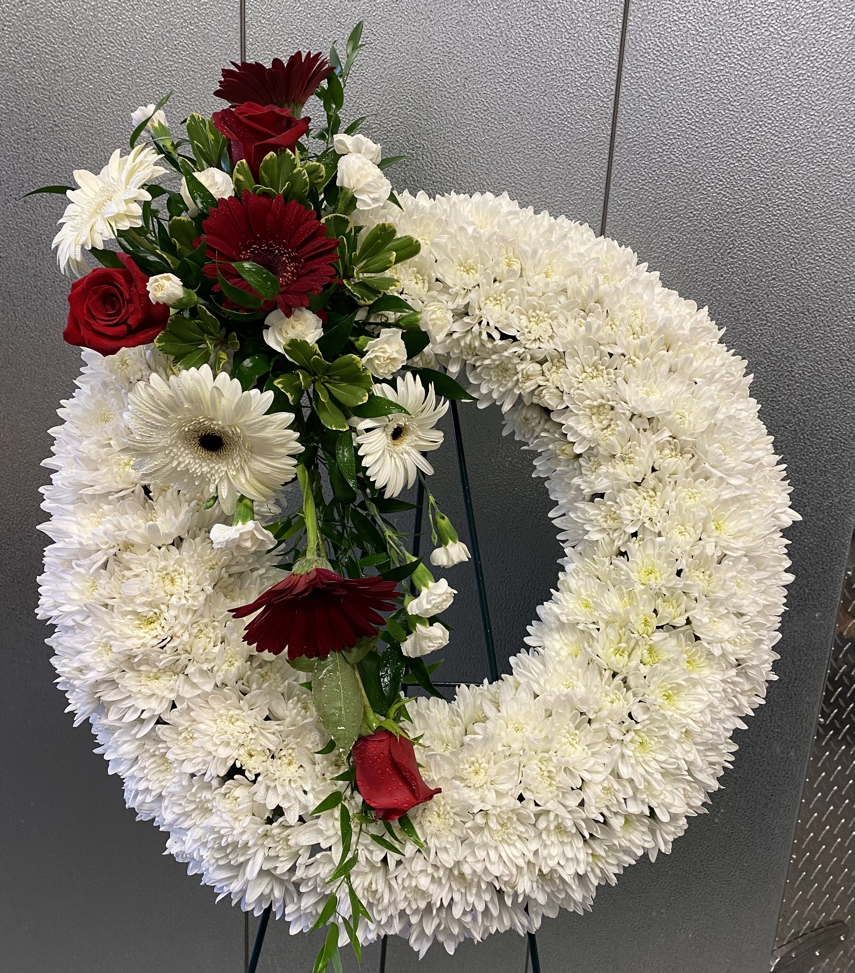 Heavenly Wreath - White flower wreath with an accent of red and white flowers