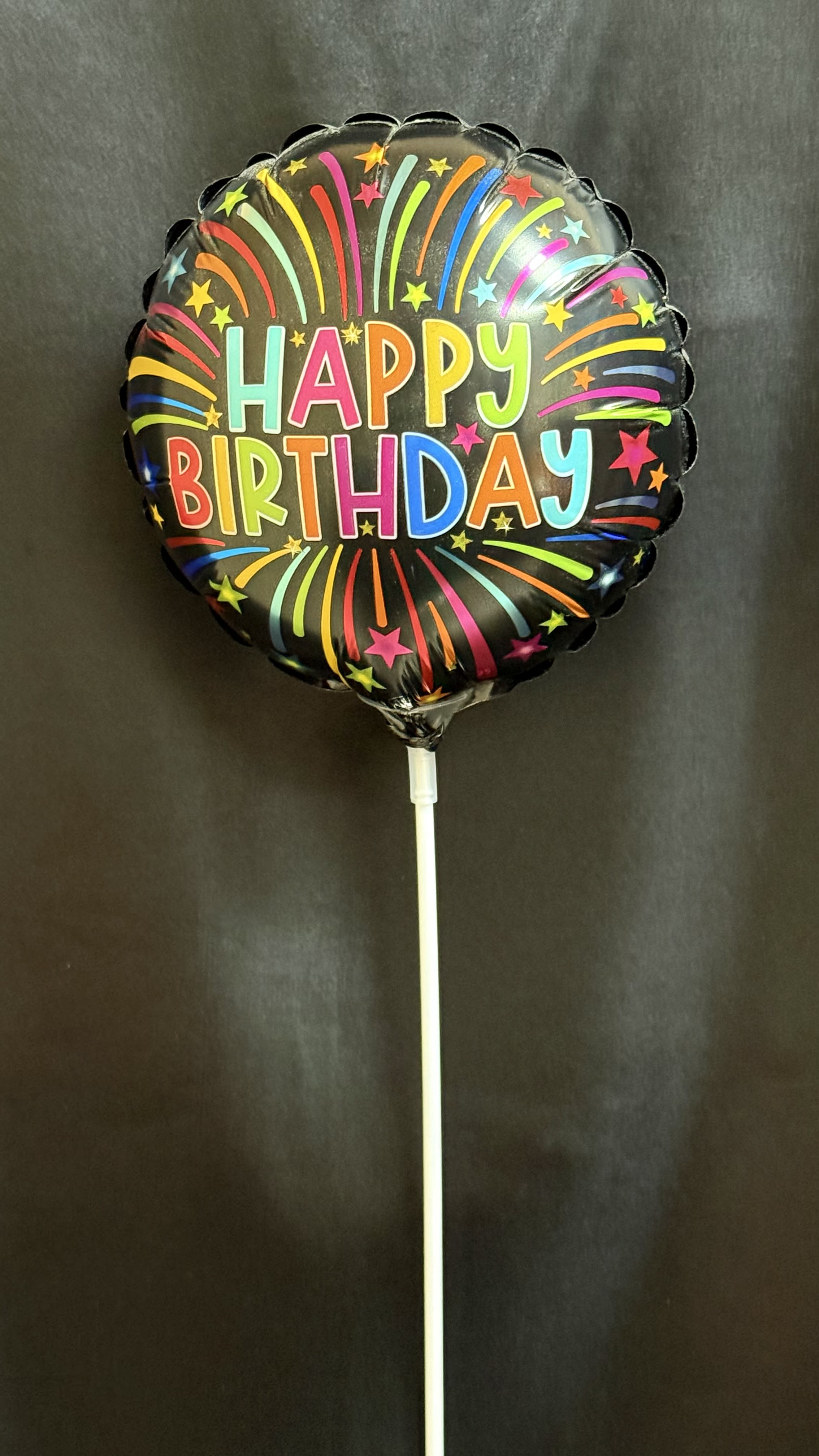 Birthday  Balloon  -  A festive &quot;Happy Birthday! &quot; balloon with bright stars and candles on black background _perfect for adding a pop of celebration to any gift or arrangement.