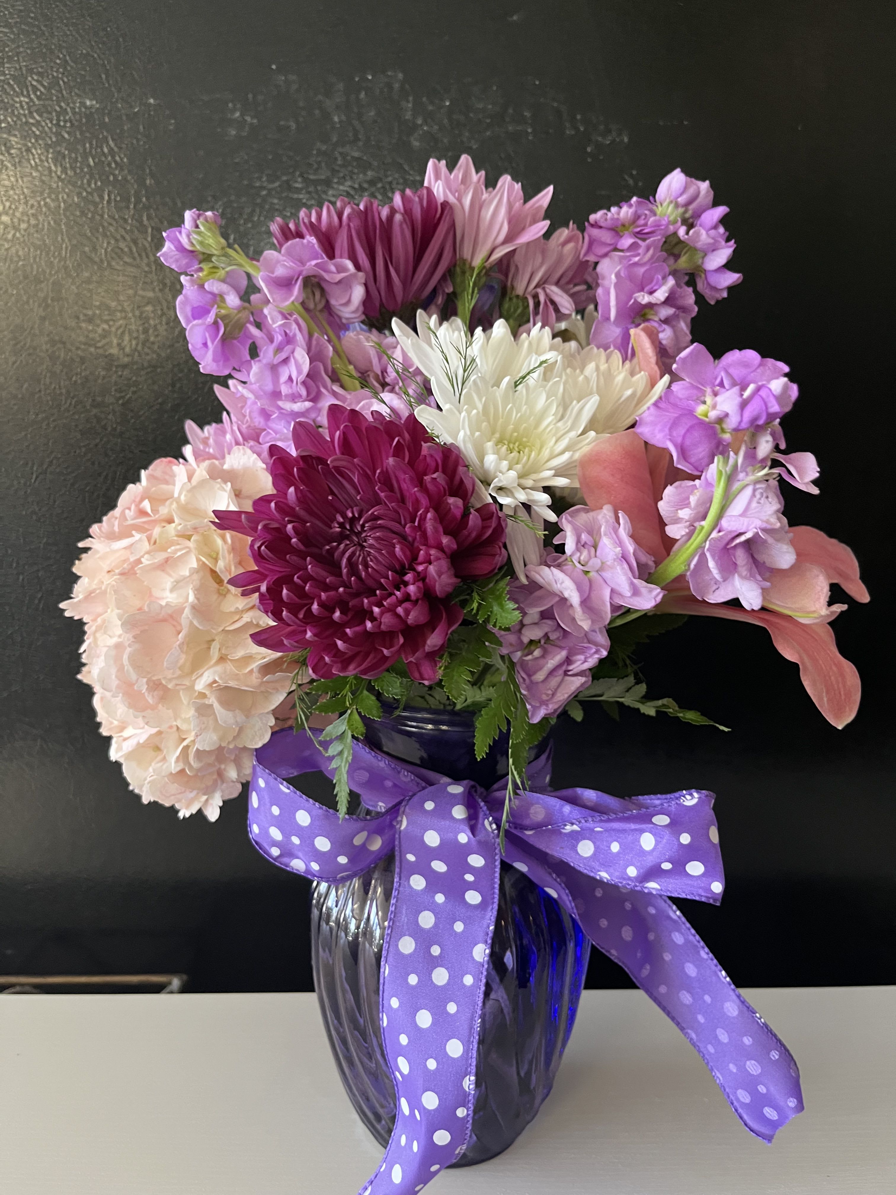 purple mix  - Fresh flowers in purple vase 
