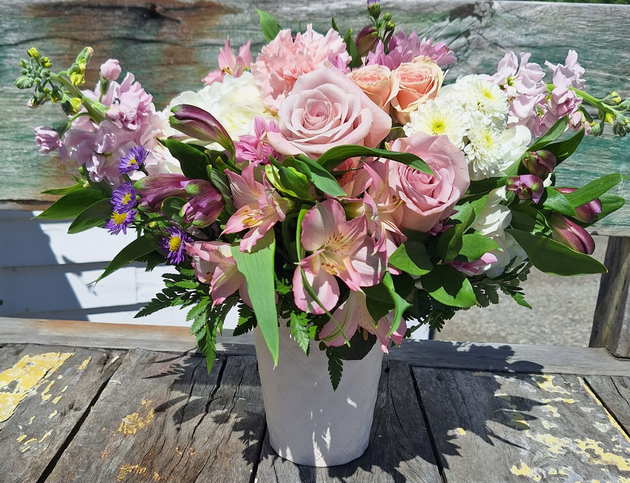 Pastels Garden Bouquet - Stock, hydrangea, roses, alstromeria, daisy poms, carnations, spray roses, lavender monte and white cushion poms in a white ceramic container