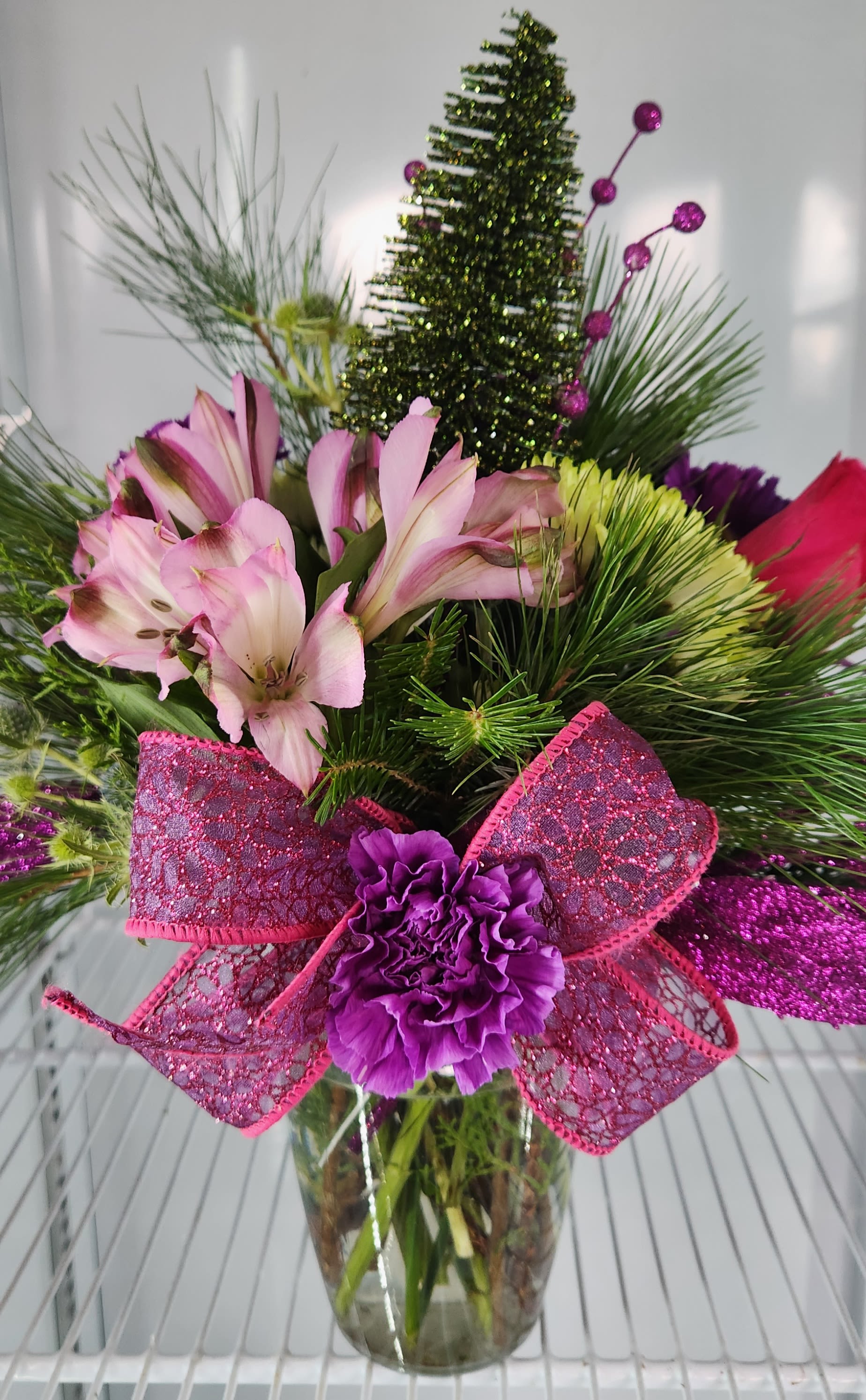 Party in Purple Party in Purple - Mixed purple flowers arranged with mixed bought of evergreen. - Ottawa Florist