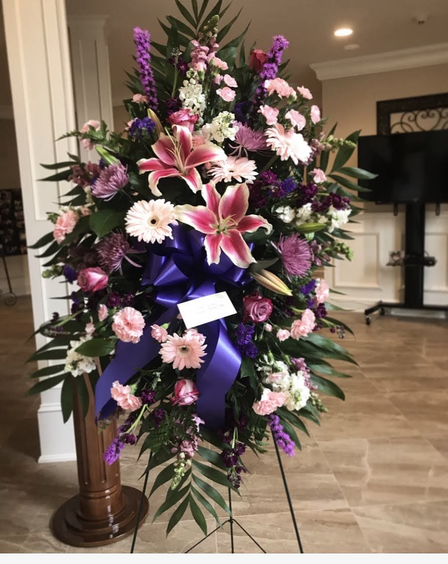 Peaceful Passions Standing Spray Peaceful Passions Standing Spray - An array of different shades of pinks and purples to put together an extravagant spray.