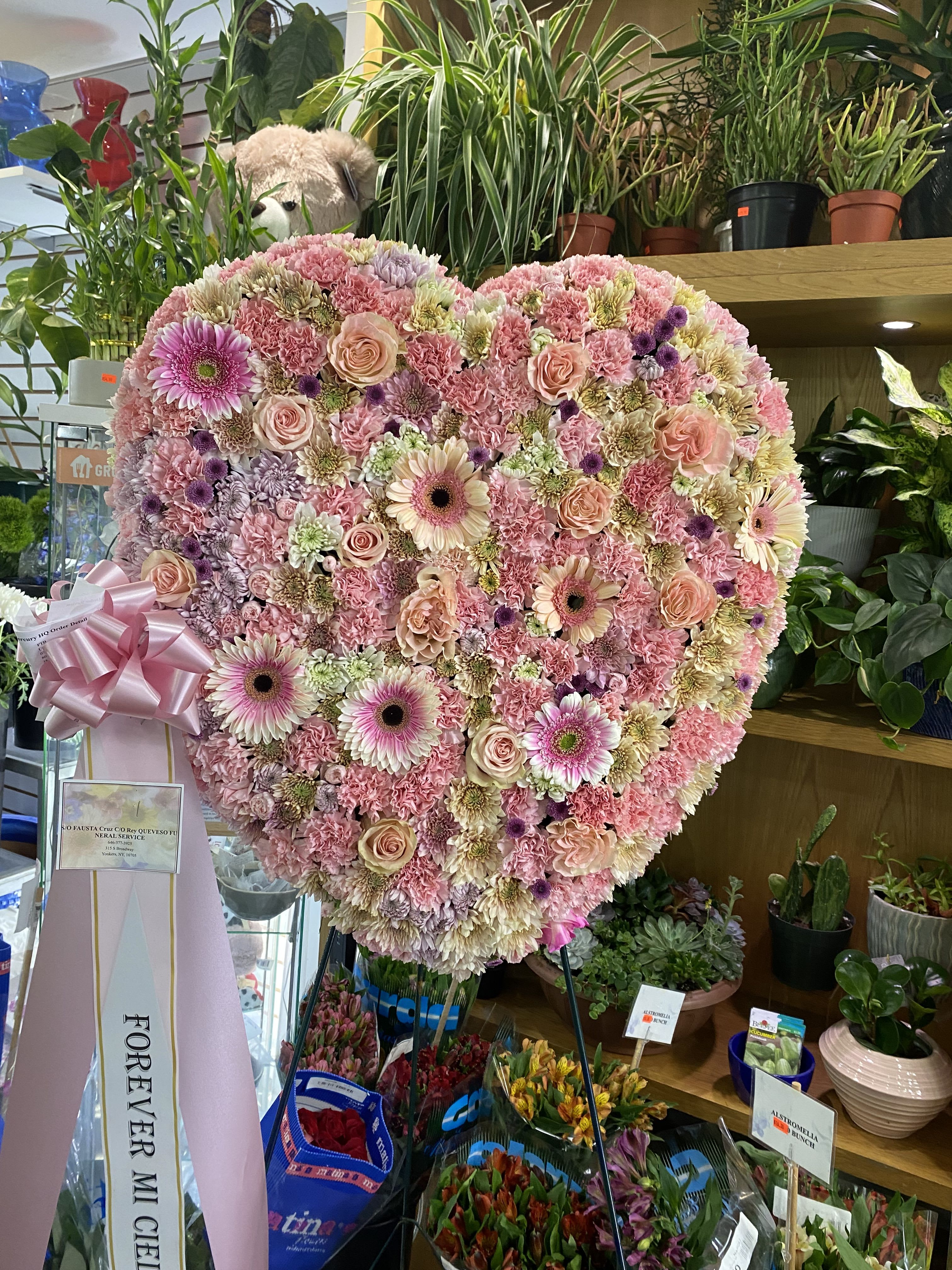 Farewell in Pink - This funeral arrangement is designed to convey deep compassion, and a gentle sense of remembrance. These flowers help evoke solace and warmth during a difficult time.